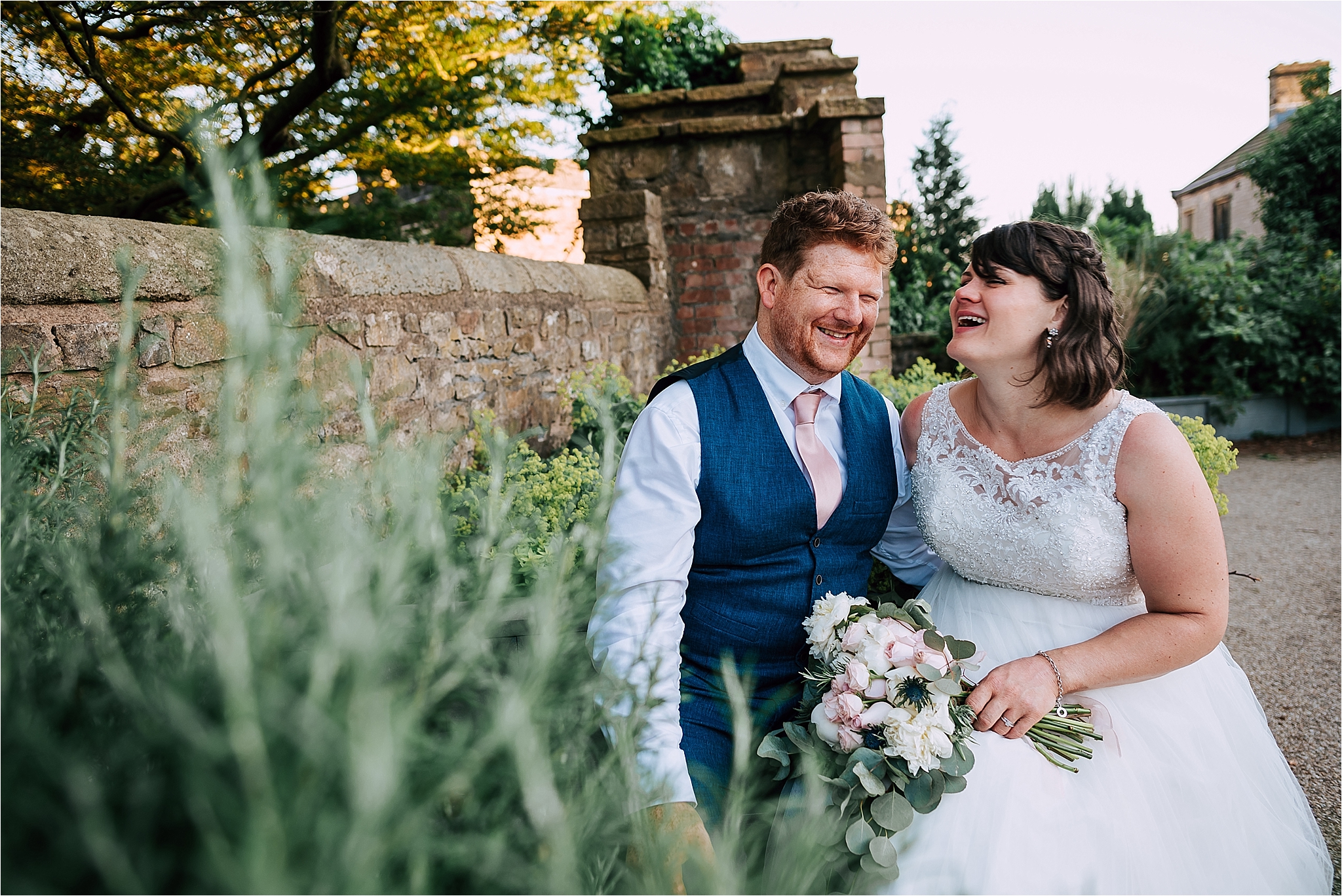 Couple laughing at wedding at the atrium clitheroe