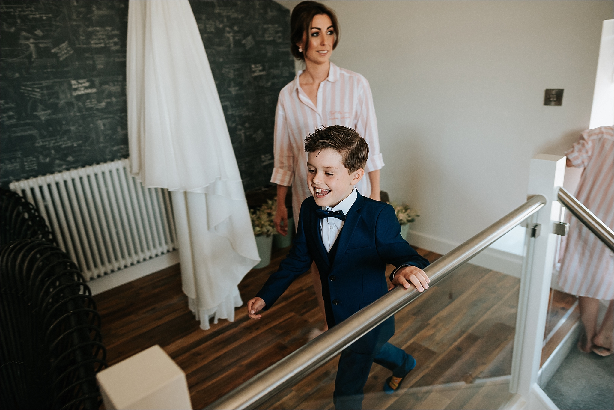 Young boy walking in penthouse, holmes mill