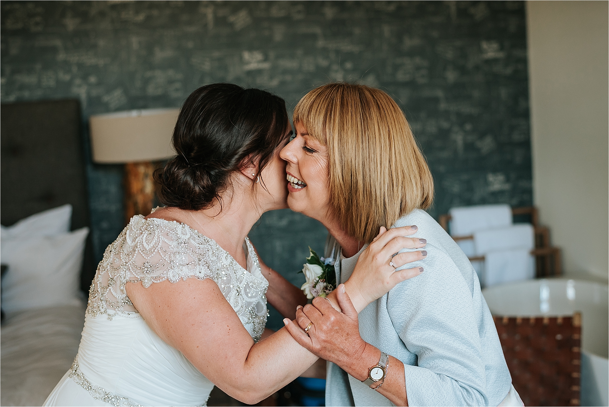 Bride and Mum in the penthouse before wedding at holmes mill 