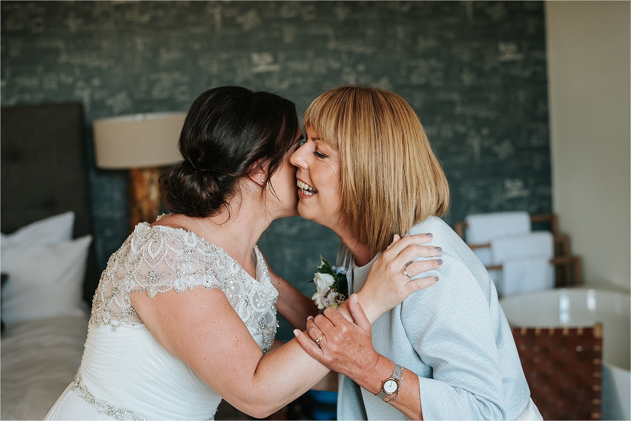 Bride and Mum in the penthouse before wedding at holmes mill
