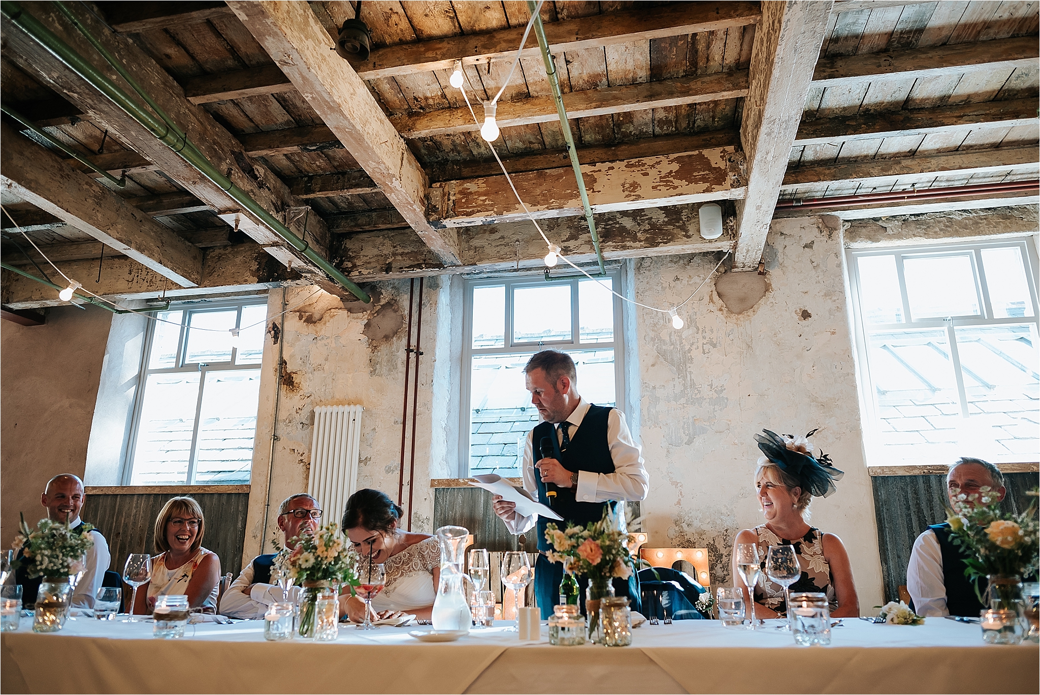 Groom doing a speech at Holmes Mill 