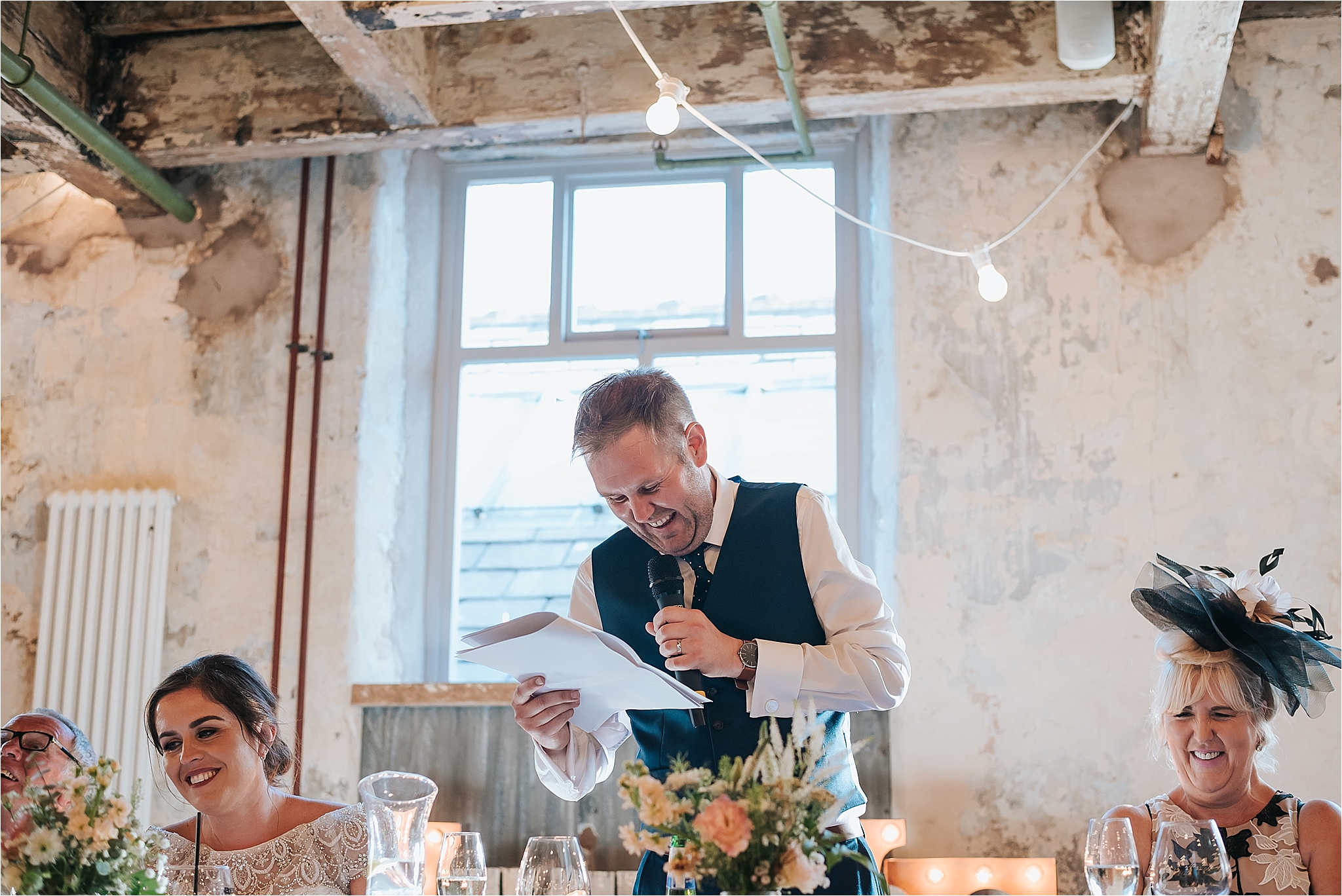 Groom at wedding at homes mill