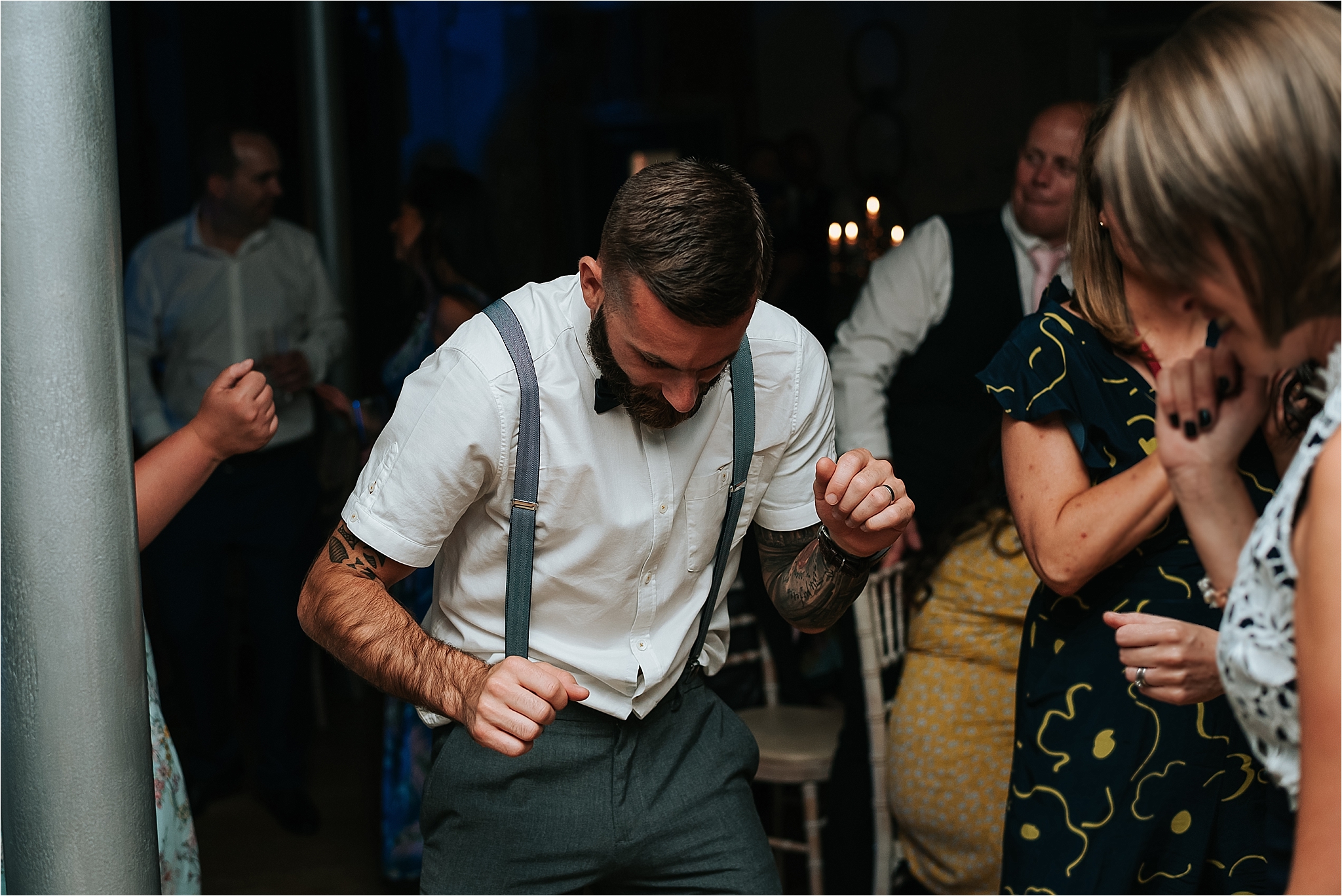 Wedding guests dancing at holmes mill