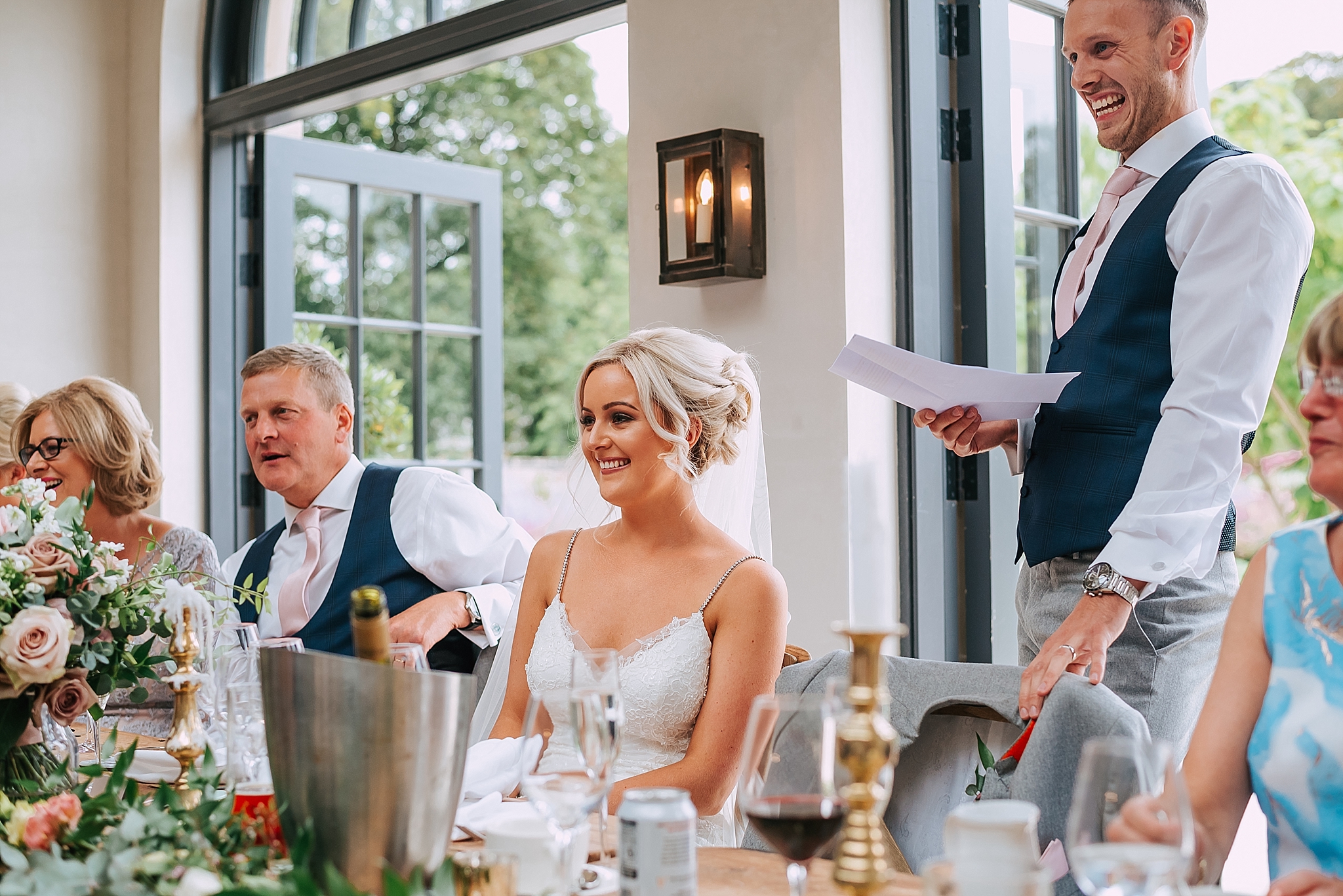 groom does his speech at fig house 