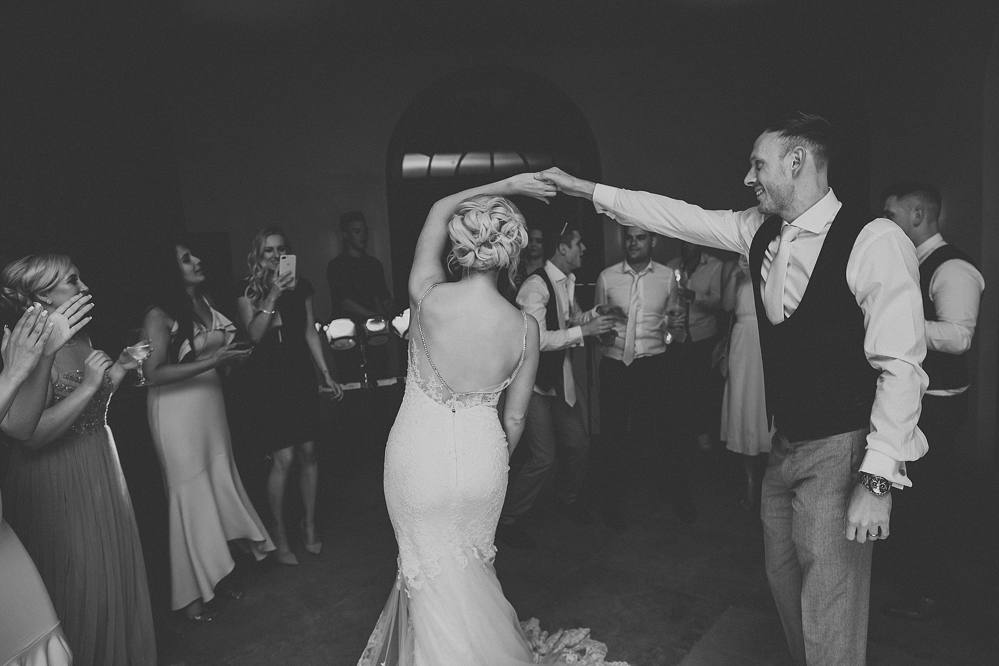 bride and groom on dance floor at the fig house