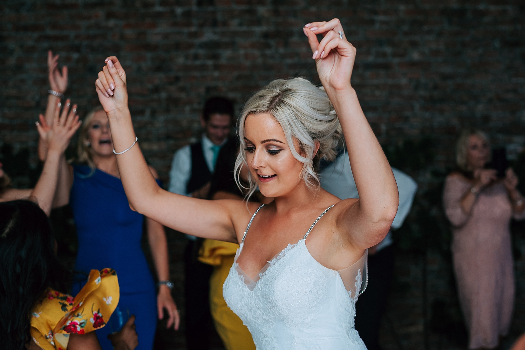 bride dancing at her wedding at the fig house 