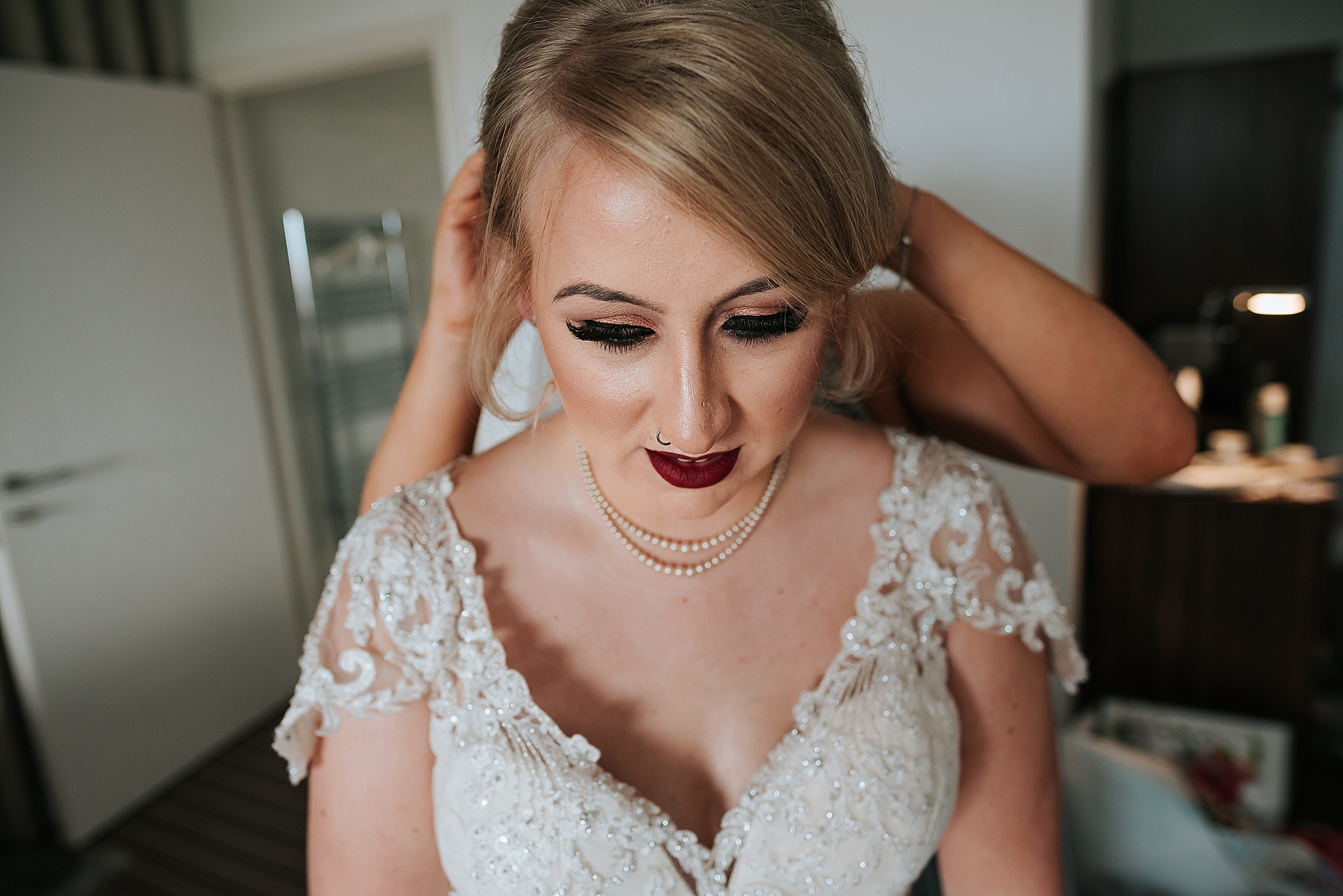 bride has wedding vale put in her hair at the grand 22 st annes