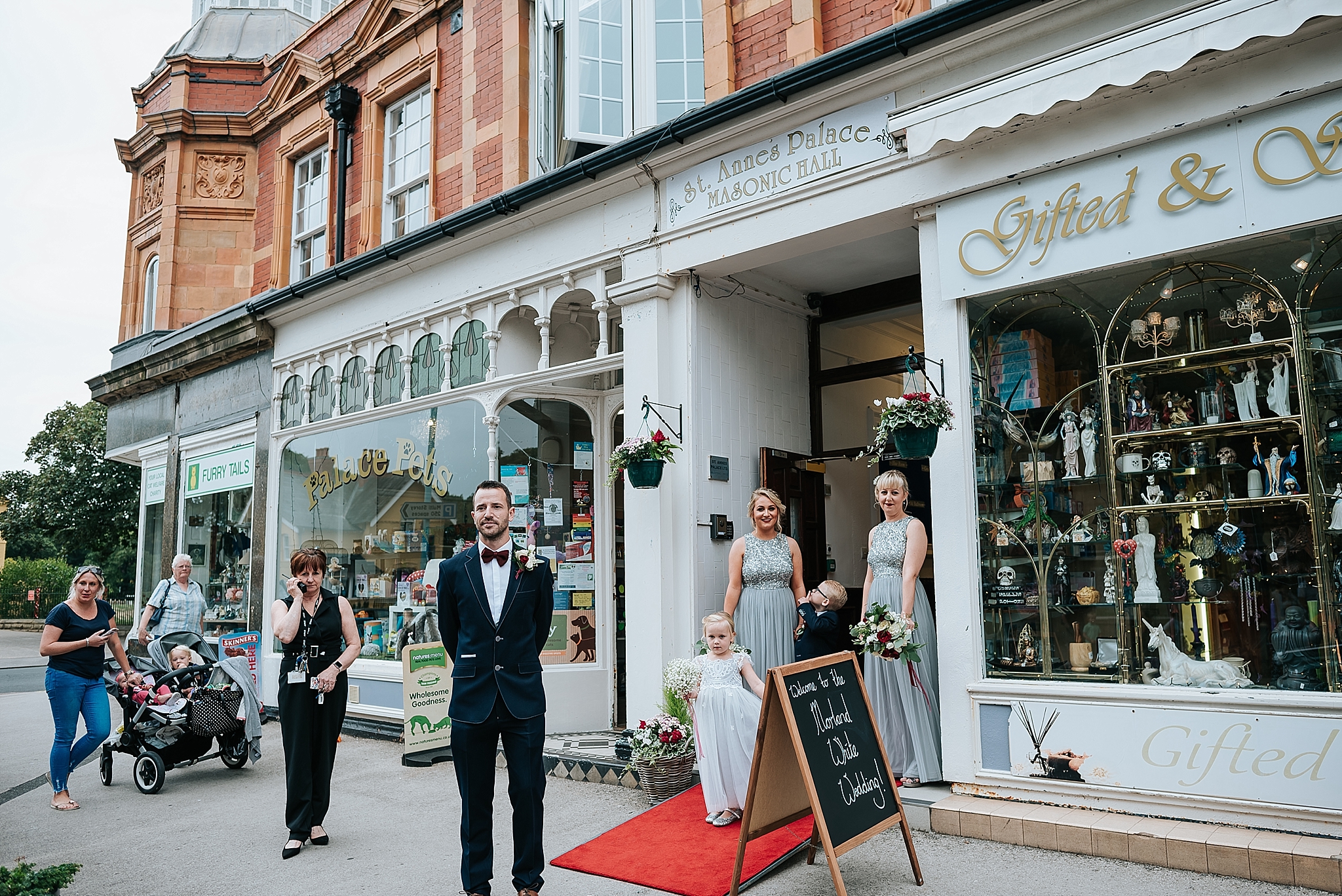 wedding party wait for bride outside st annes palace