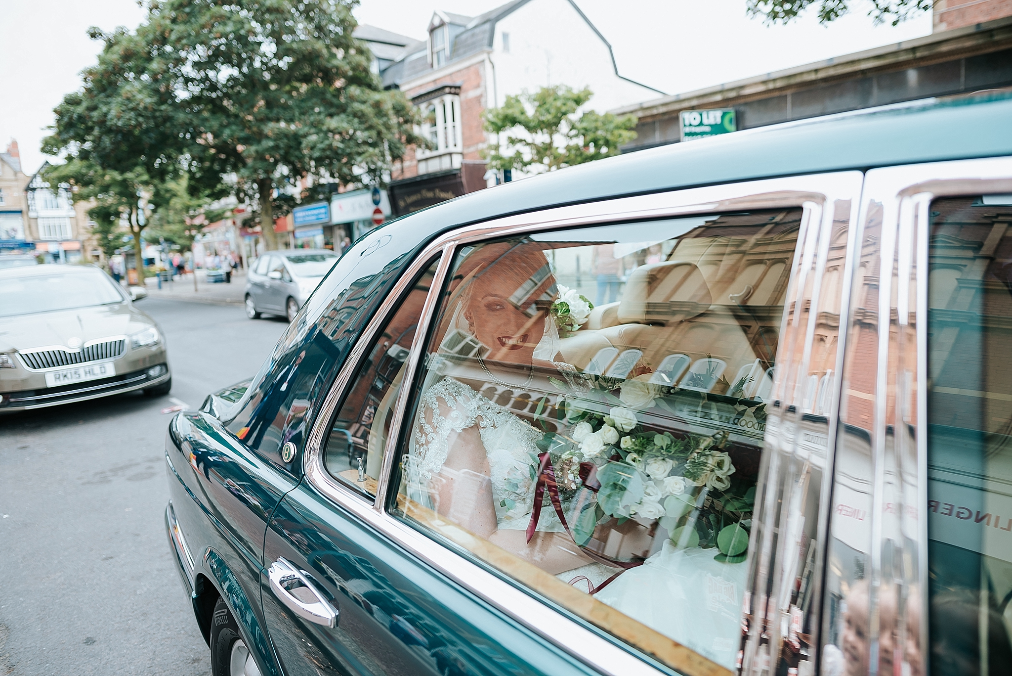 bride arrives at wedding at st annes palace in lancashre 