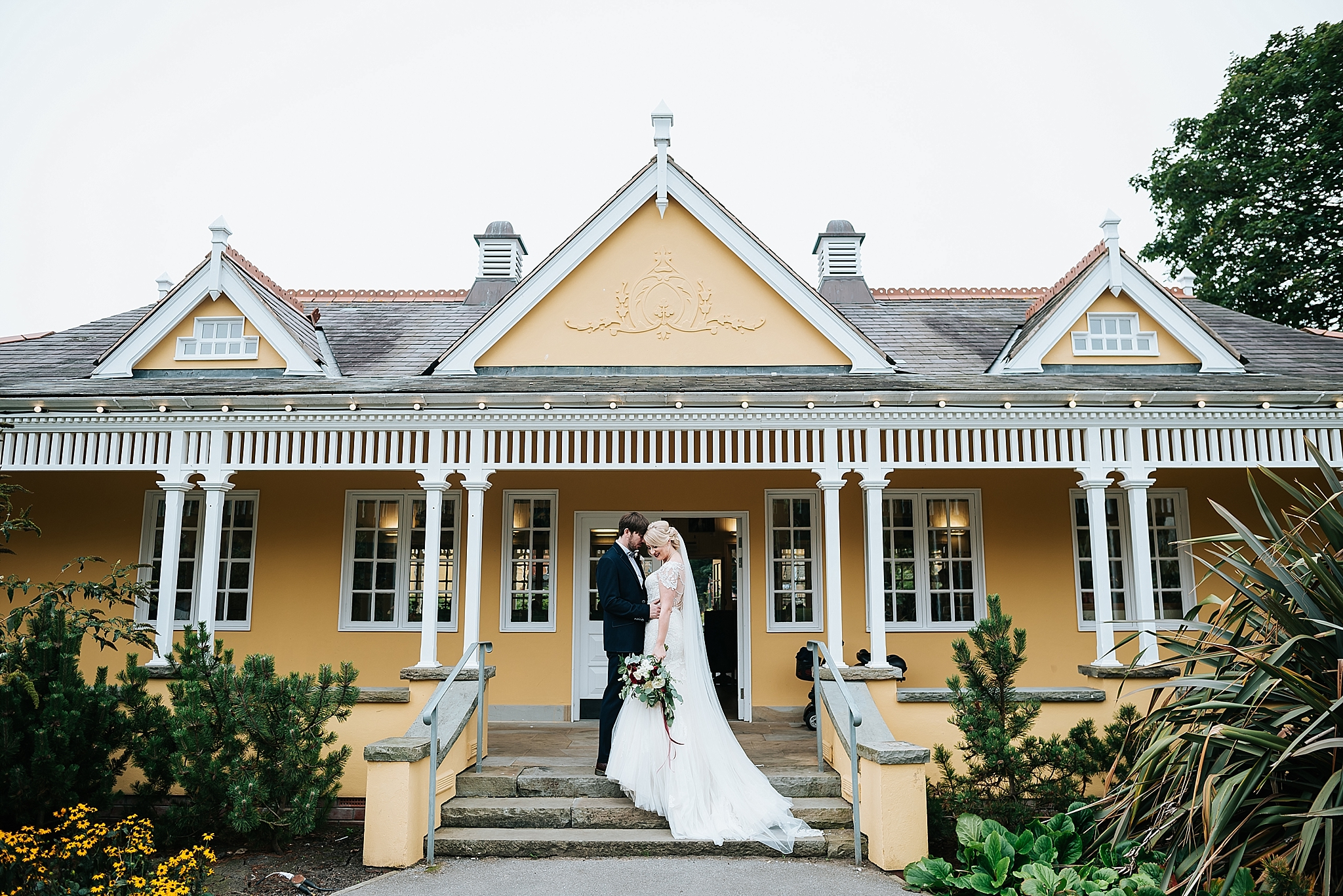 bride and groom outside aston park pavilion 