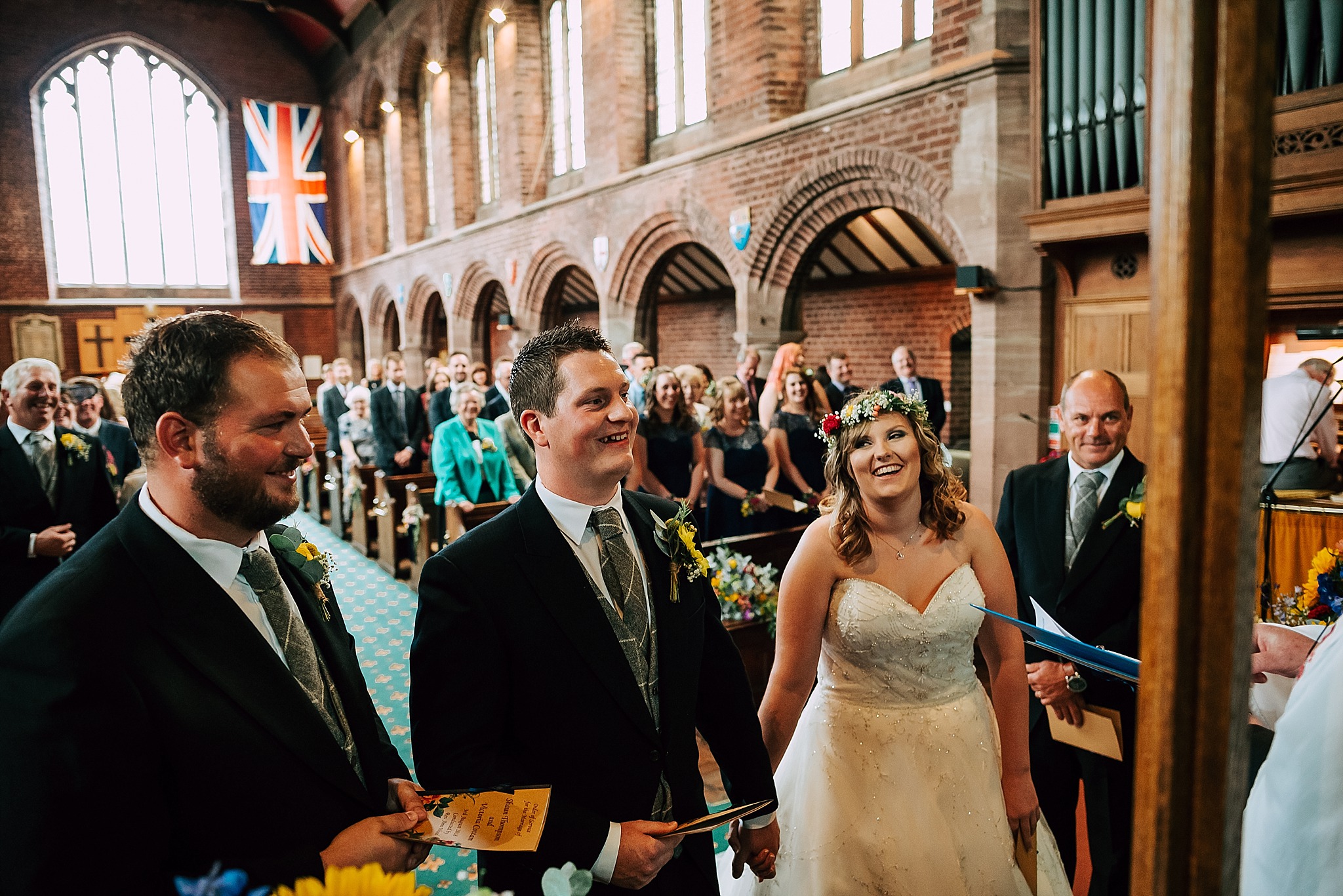 bride and groom laughing at wedding at christ church