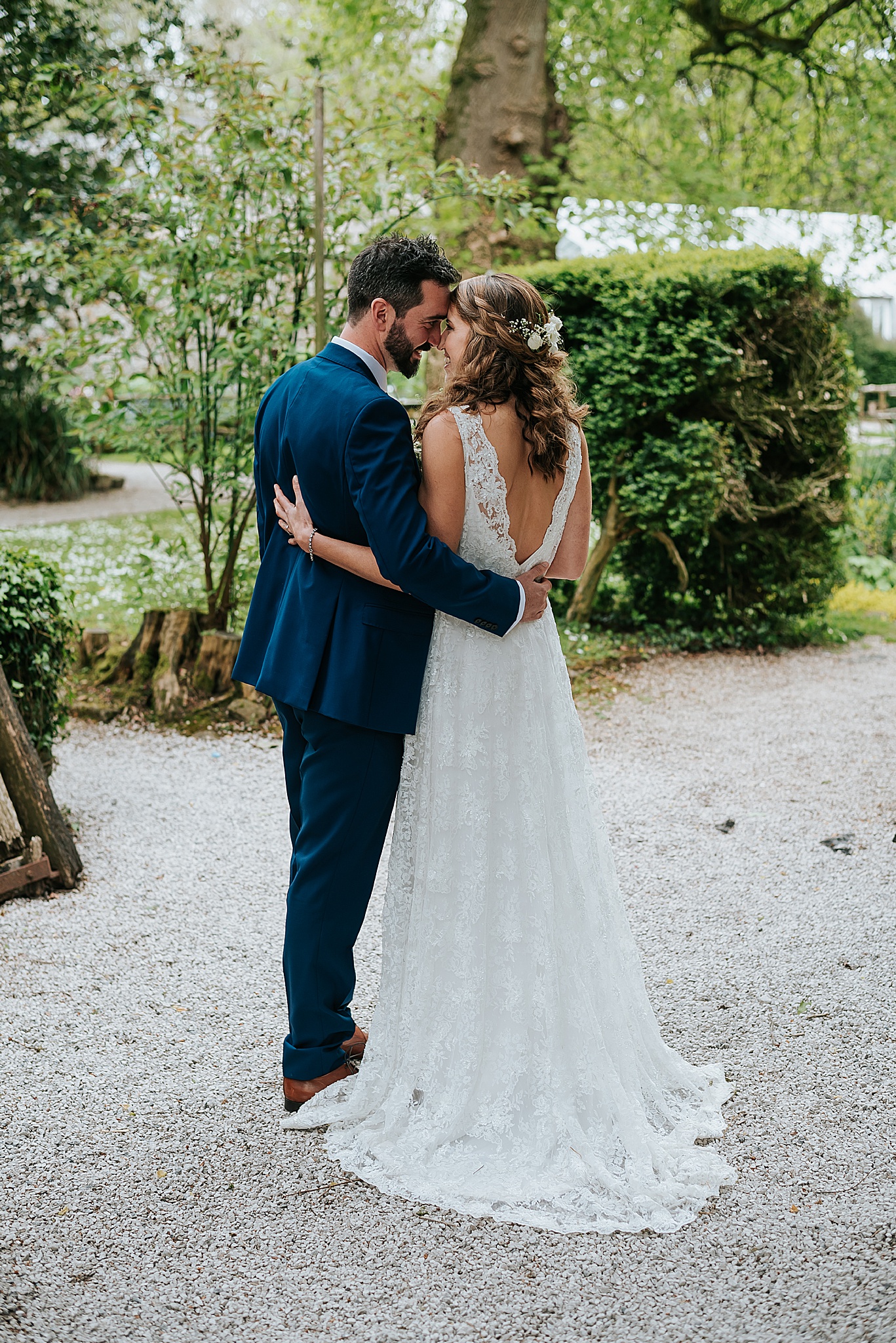 bride and groom kissing at relaxed wedding at wyresdale park