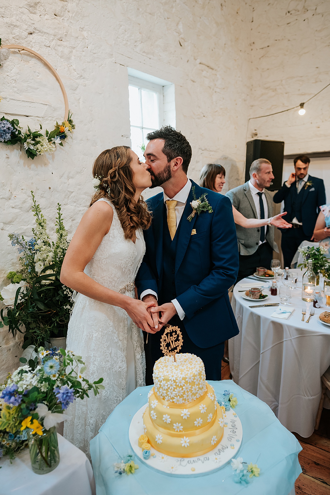 bride and groom cutting the cake at wyresdale park