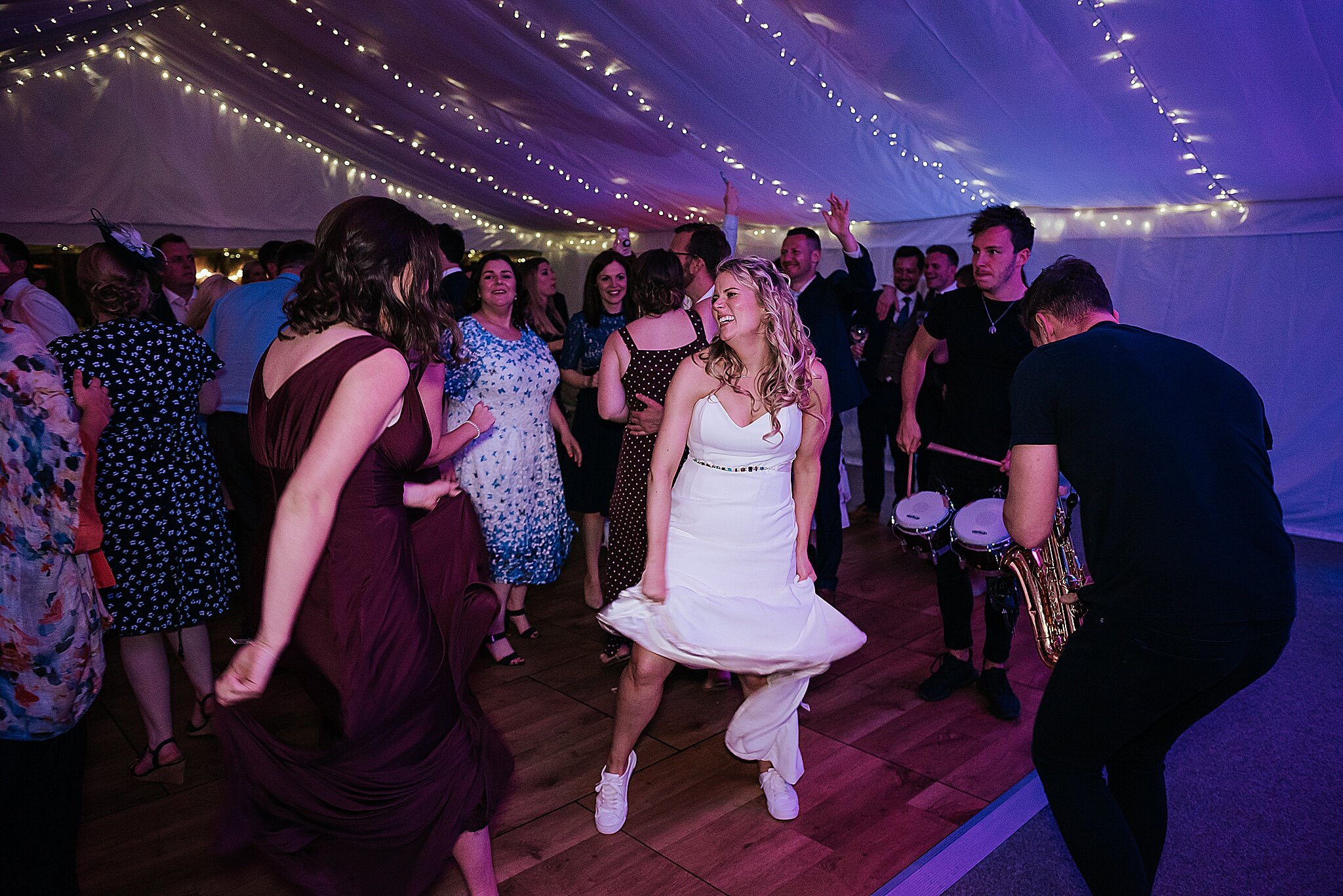 bride dances on dance floor at wedding 