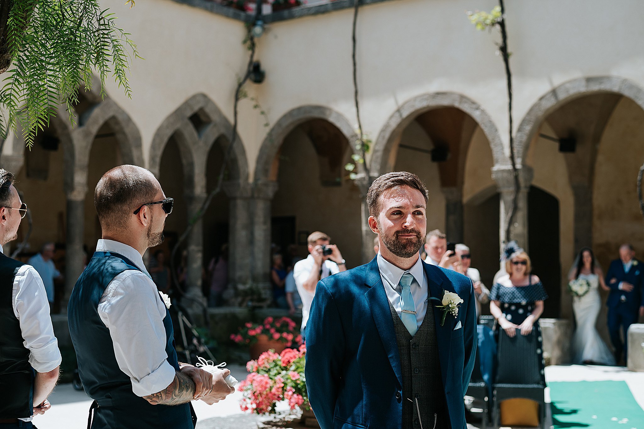 groom waiting for bride at the cloisters in sorrento 