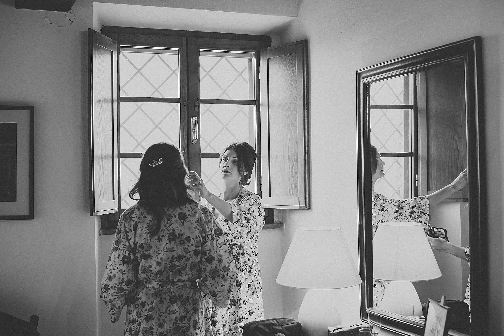 bride getting ready before wedding in tuscany, italy 