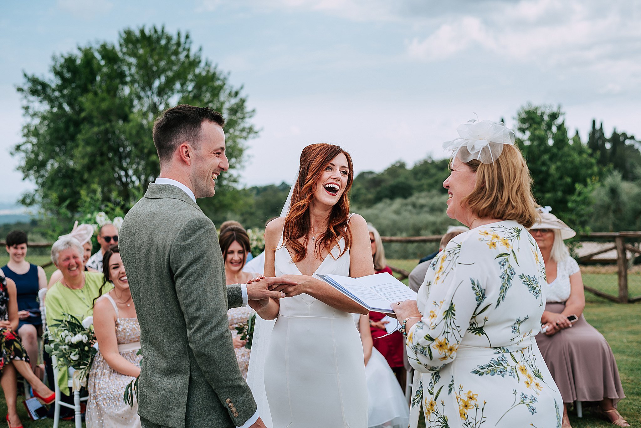 bride and groom at outdoor wedding ceremony in tuscany 