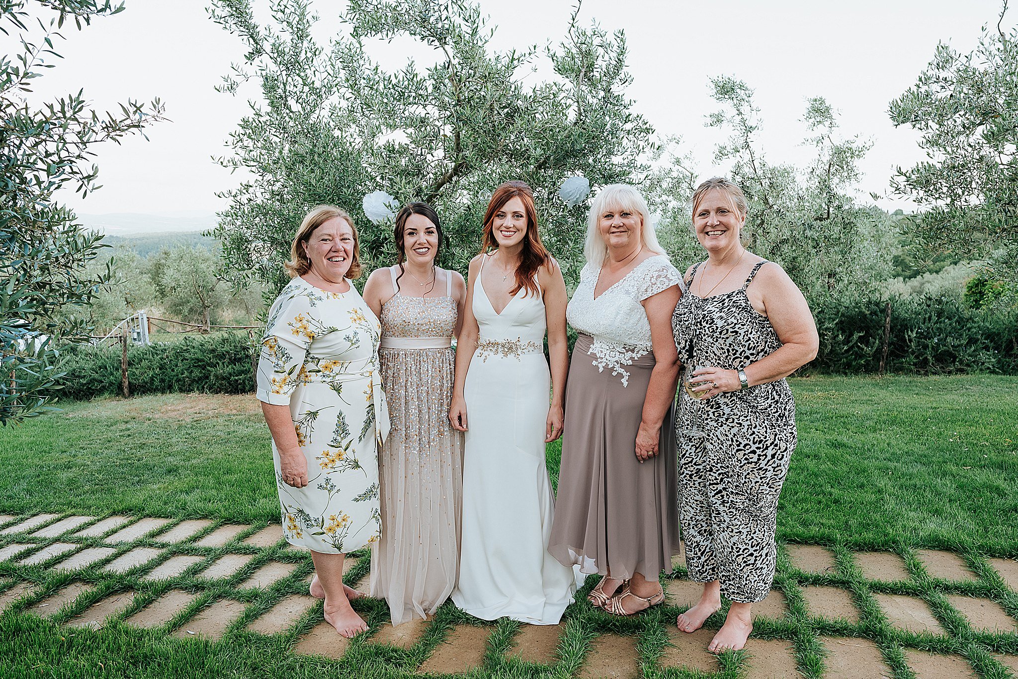 bride and bridal party at countryside wedding in tuscany