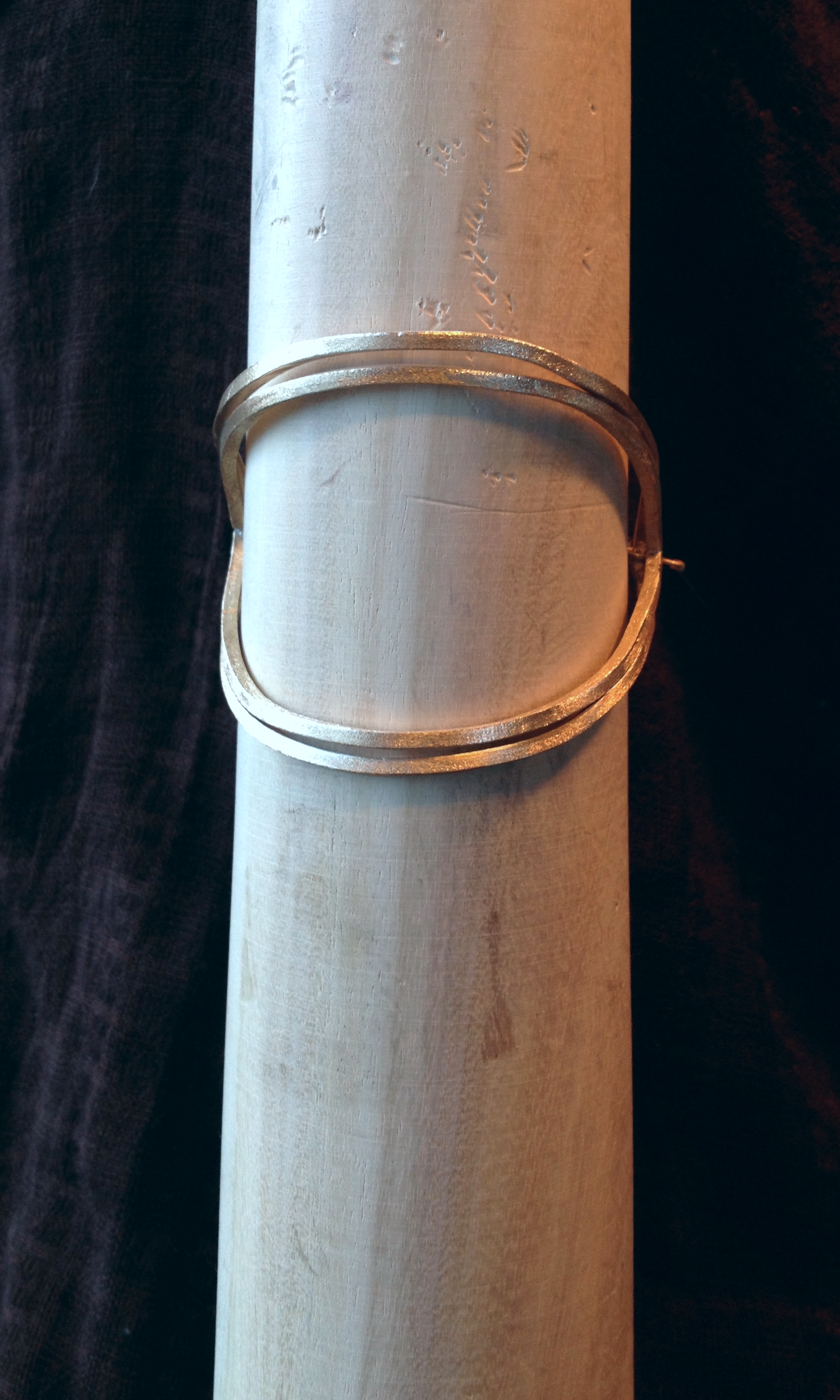 polished brass double cuff with round chain clasp