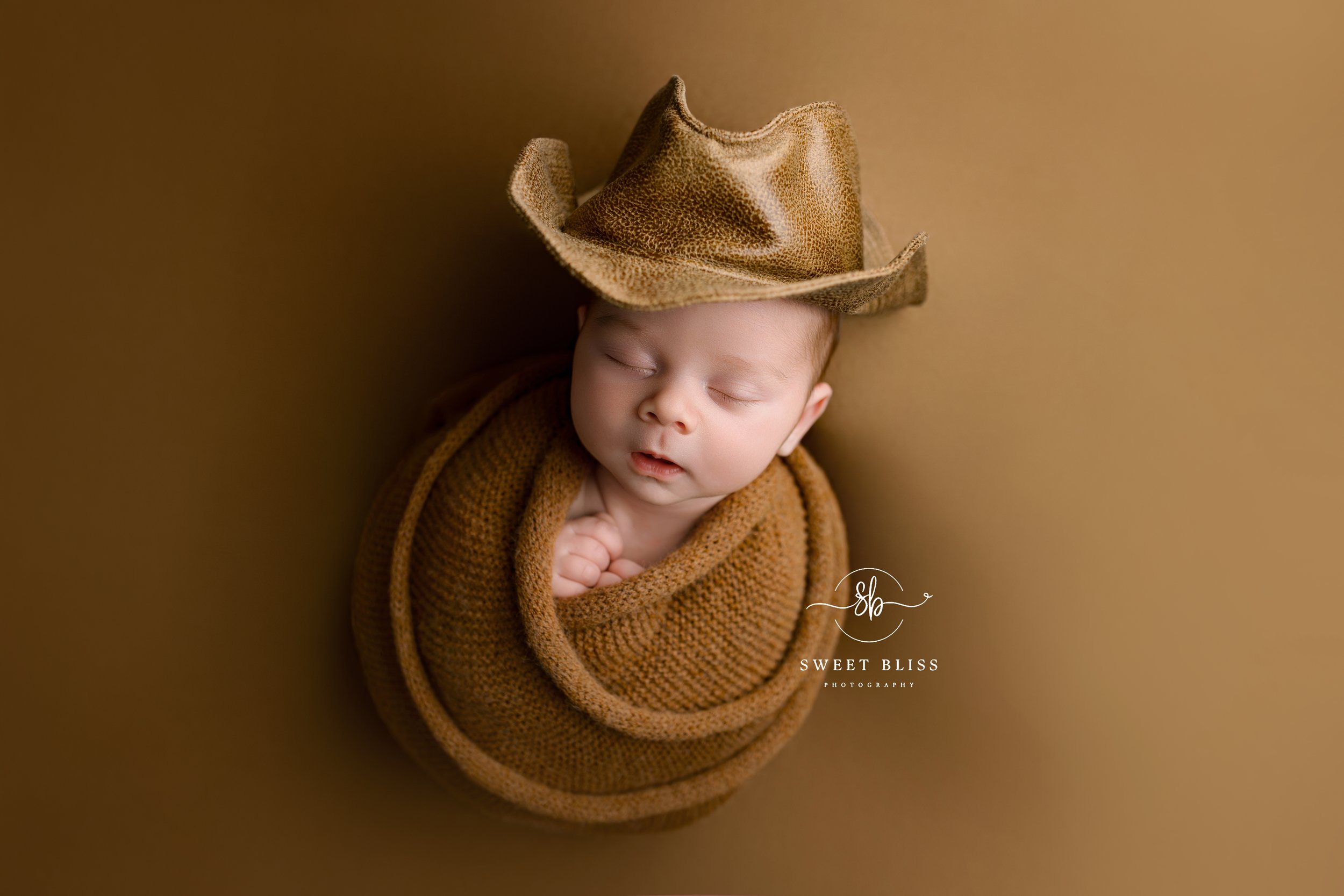 newborn country western session cowboy hat baby photographer harford county maryland