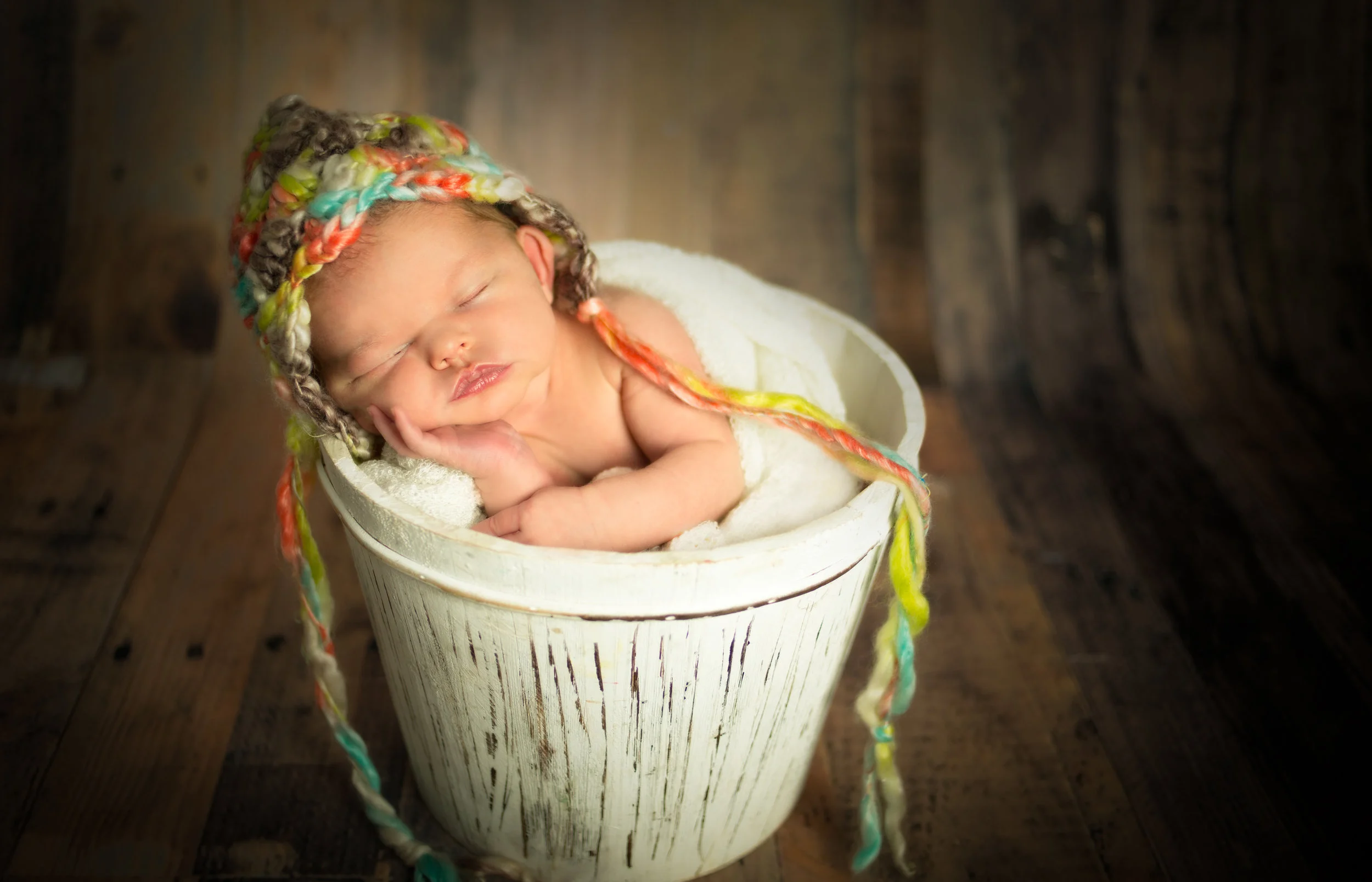 Newborn in a bucket