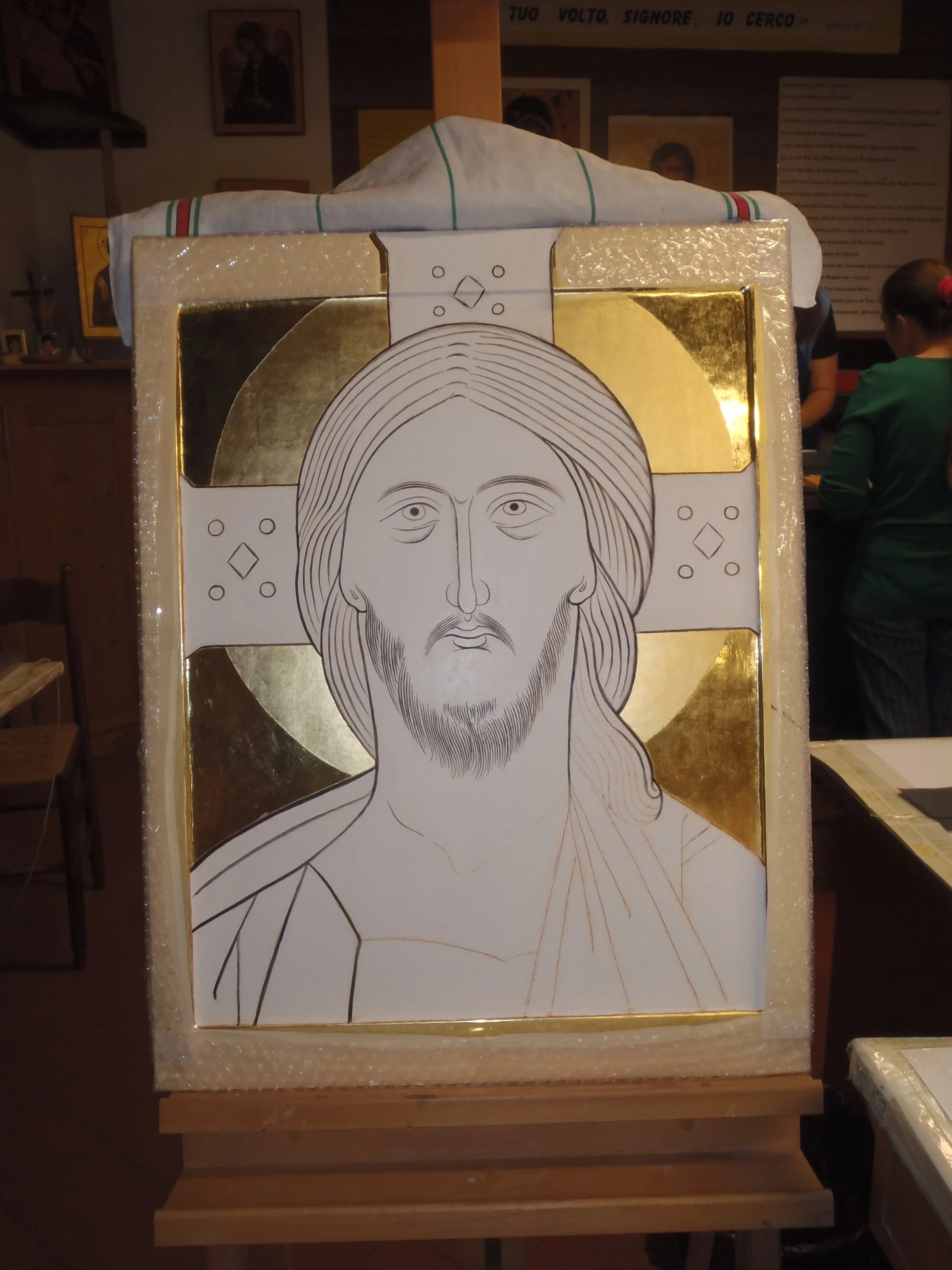 Initial drawing on gilded board.