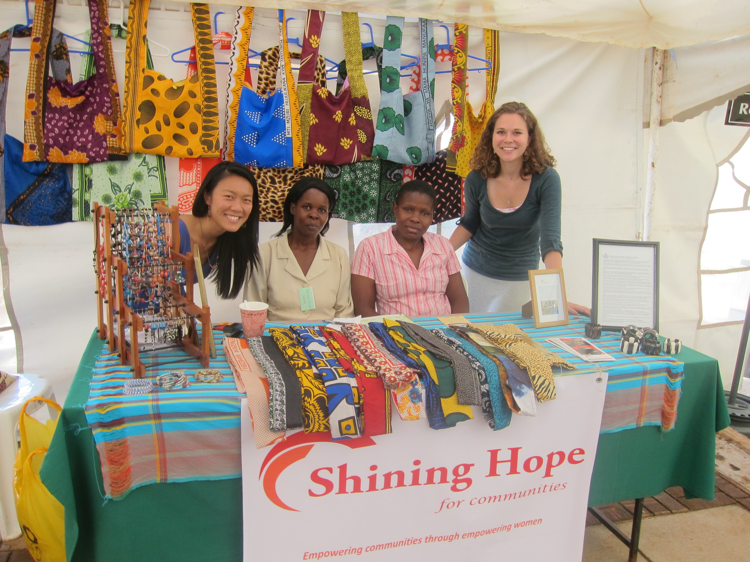 Xiaoxi, Shining Hope's Manager of Strategic Partnerships, along with Rose, Joan, and Jessica, a Shining Hope fellow