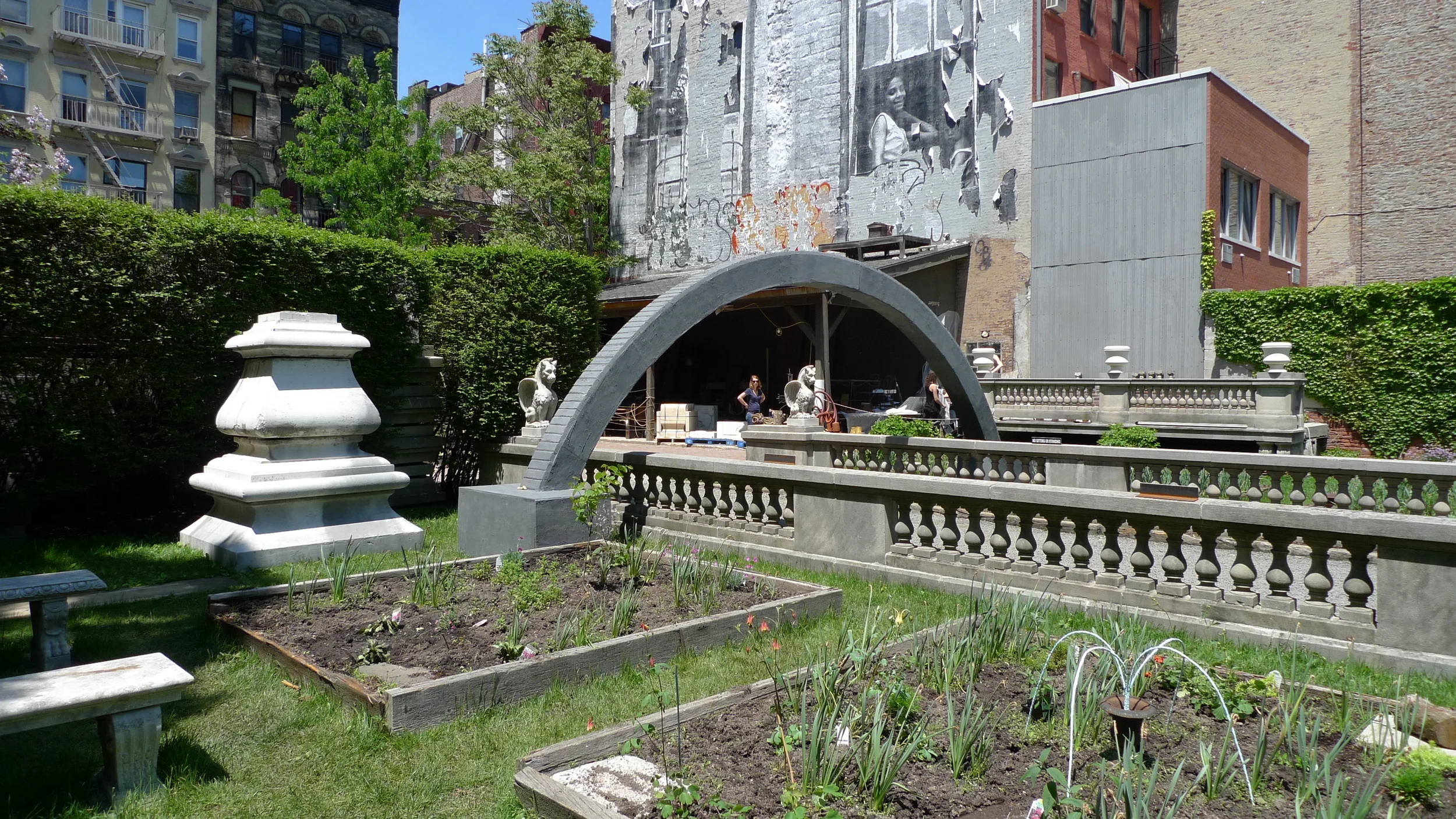   Hold Me in Your Long Arms . Detail view. 25' long x 10' tall. Treated lumber, hardware, rebar, sandbags, vortex anchors, cable, elastomeric compound, iron oxide. 2014. 