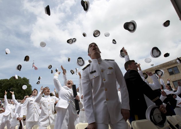 graduates-of-the-United-States-Merchant-Marine-Academy-toss-their-hats-in-the-air-to-celebrate-their-graduation-in-Kings-Point-N.Y..jpg