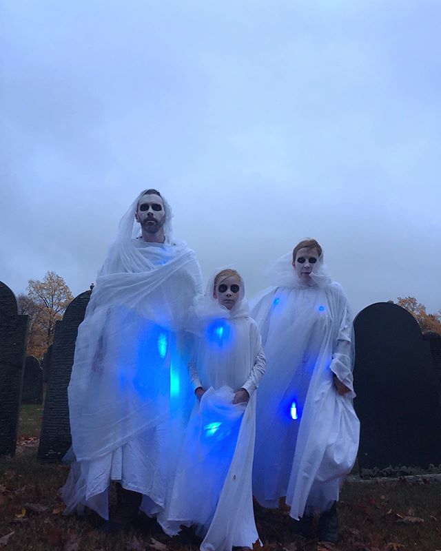 It was a windy, wet night as the glowing ghosts emerged from the graveyard. 
#annualfamilyphoto @jonroy