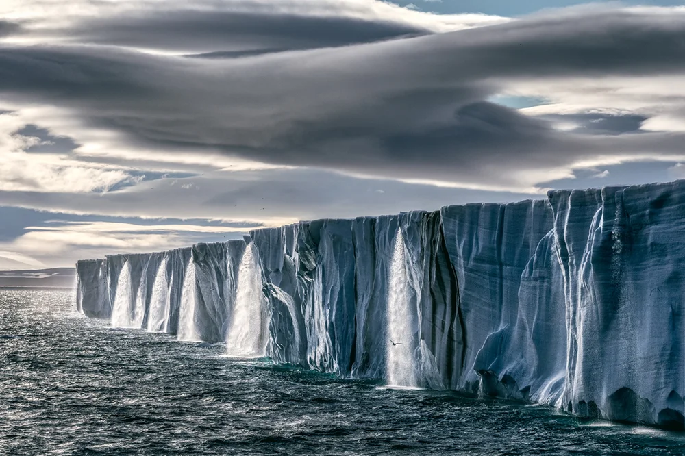 &nbsp; The Nordaustlandet ice cap gushes high volumes of meltwater - Photo Paul Nicklen