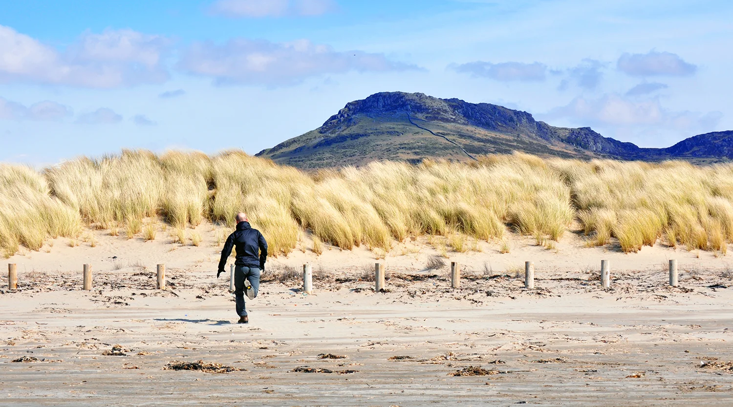 ...couldn't find a photo of me running... so my brother running on a beach in winter a couple of years back is the best I have ;-)