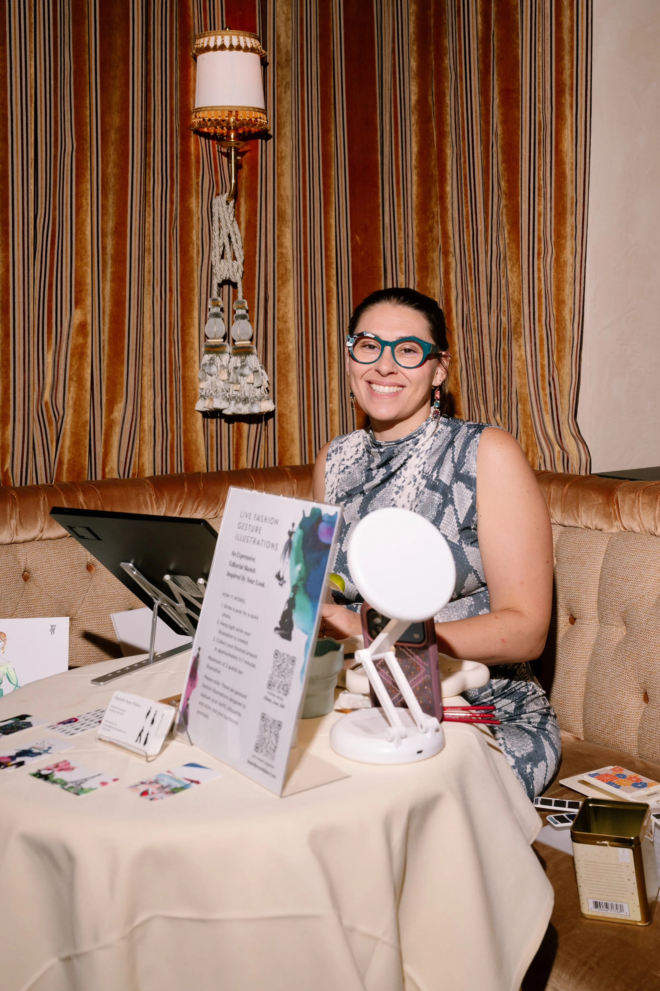 Danielle Rose Fisher creating live fashion gesture illustrations at the Angel Ball Launch Party, hosted by Denise Rich and Gabrielle's Angel Foundation
