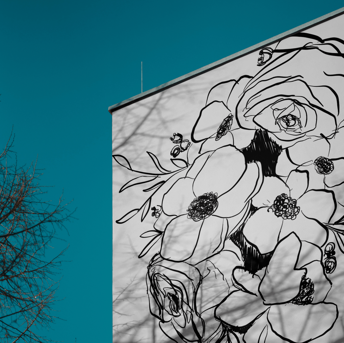 Large-scale watercolor floral mural by Danielle Rose Fisher — NYC mural artist for commercial spaces