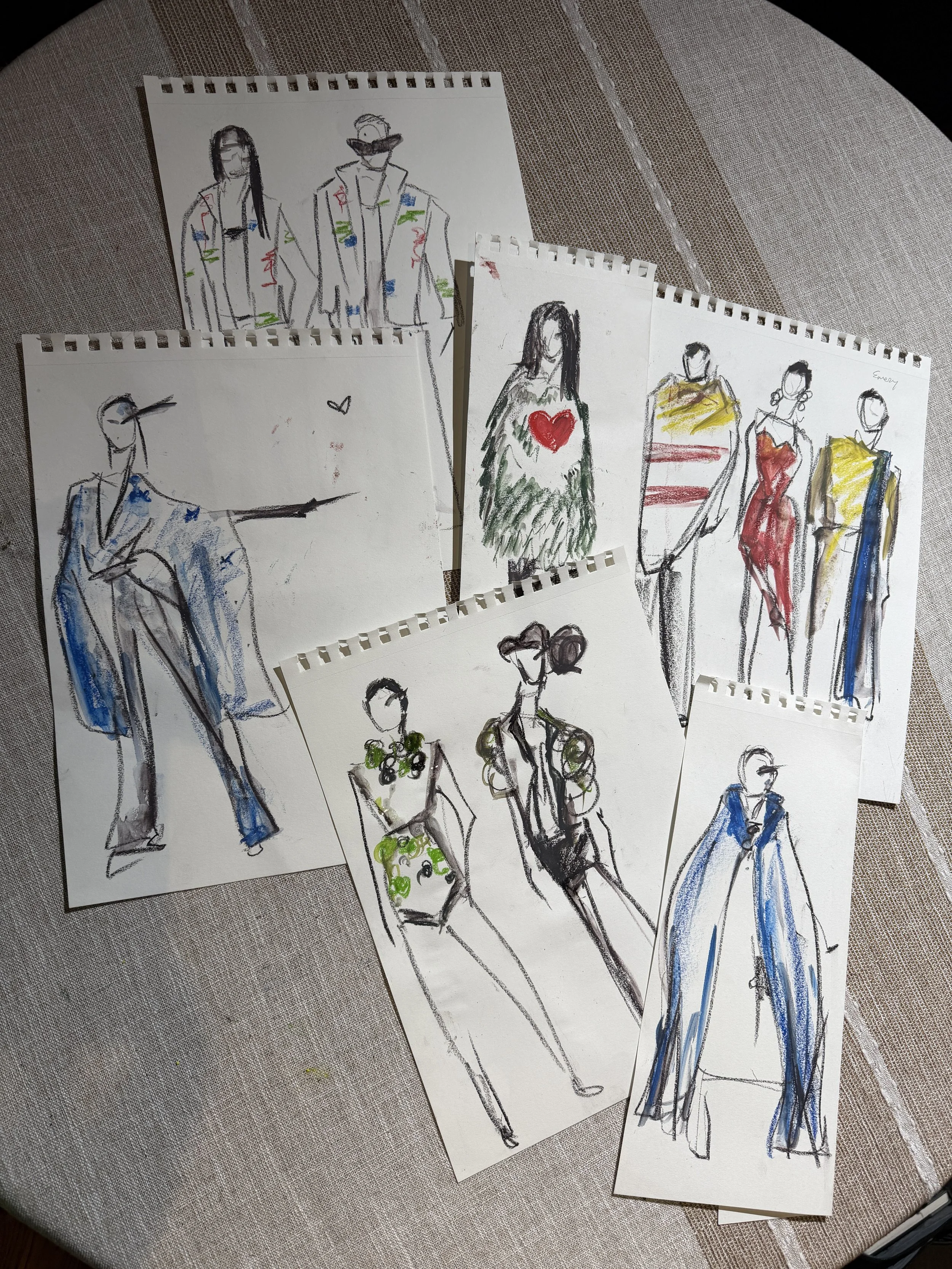 A collection of expressive watercolor fashion illustration sketches capturing runway-inspired looks and garment movement.