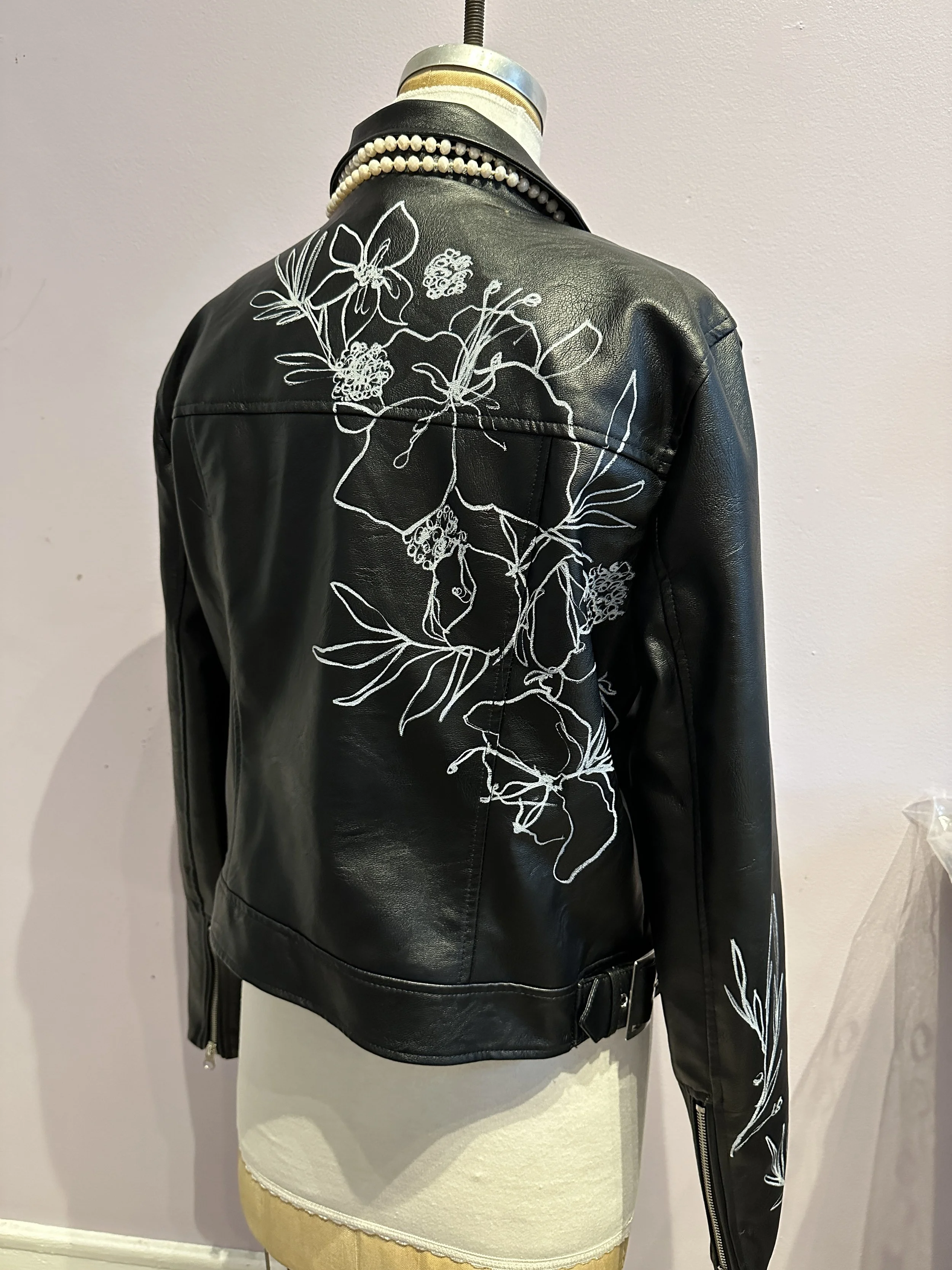 Custom hand-painted floral watercolor leather jacket — bespoke wearable art by Danielle Rose Fisher NYC