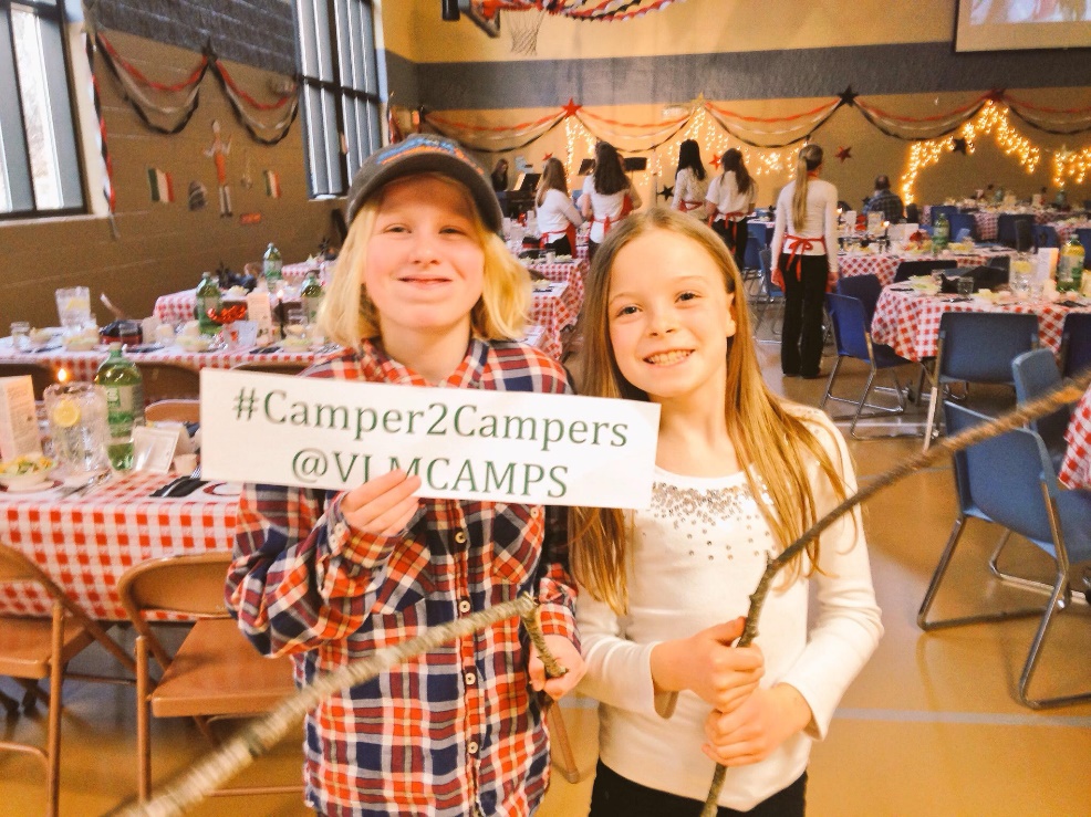Trinity, Long Lake Campers celebrate at their Summer Ministries Auction.