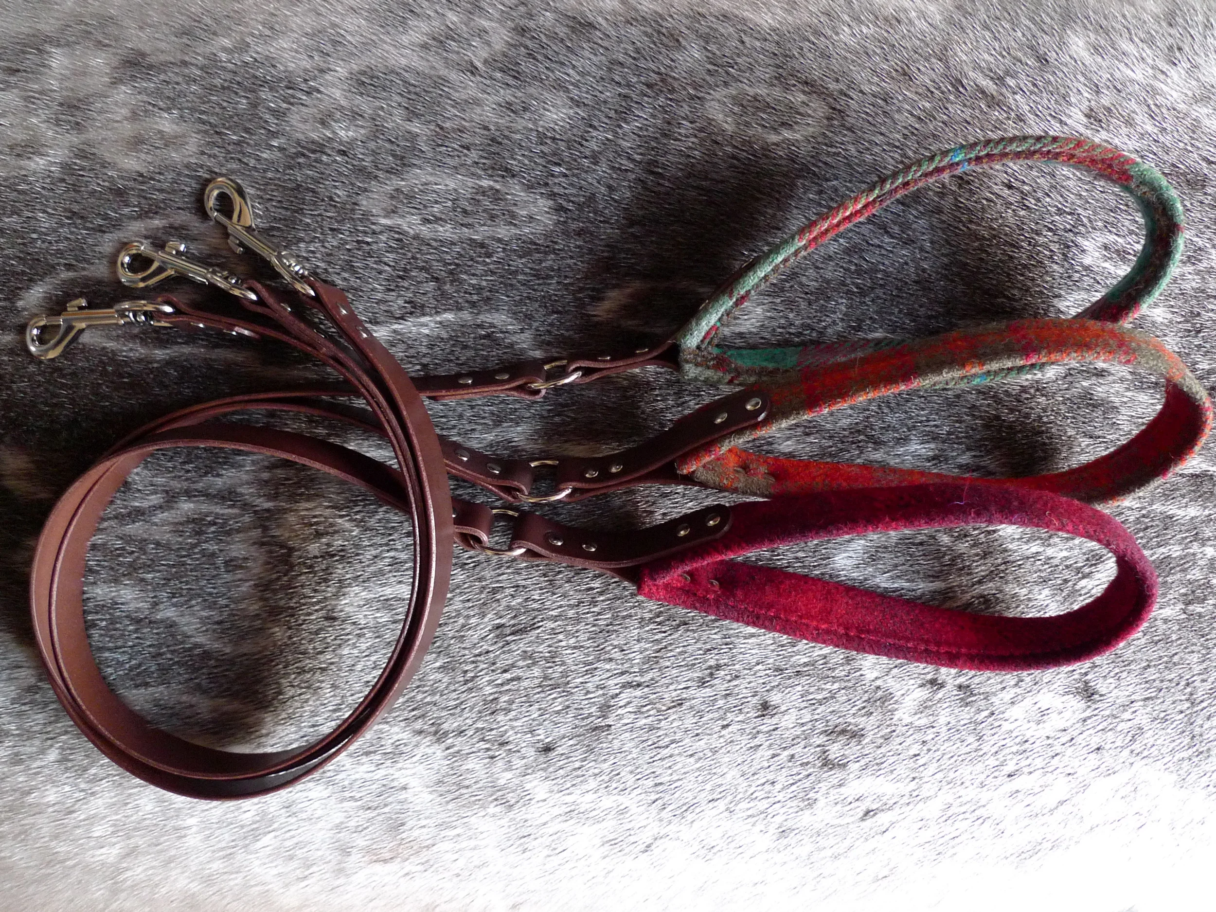 Turquoise red and brown tartan, orange grey/green tartan, red tartan Harris Tweed Country collection leads