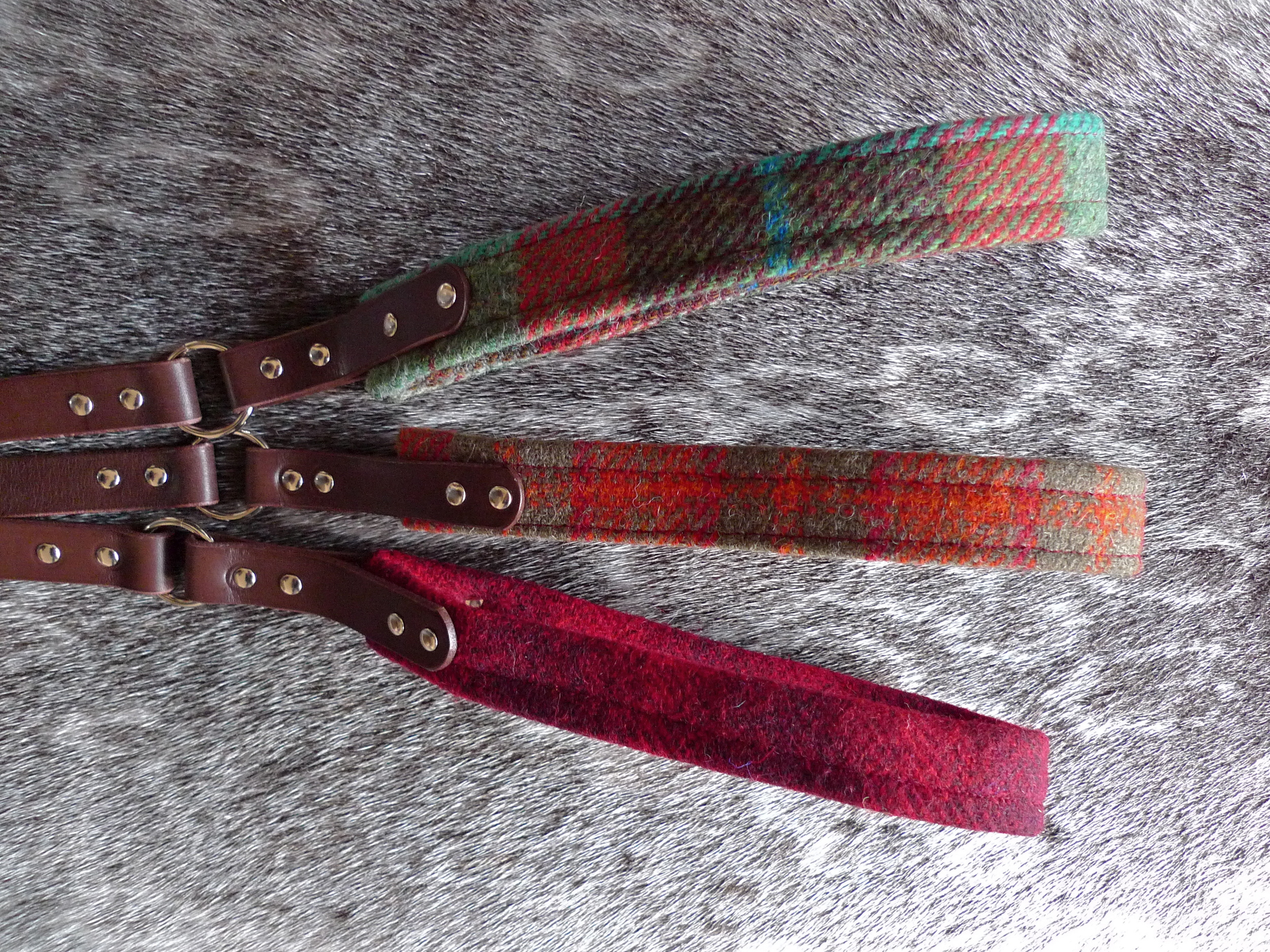 Turquoise red and brown tartan, orange grey/green tartan, red tartan Harris Tweed Country collection leads