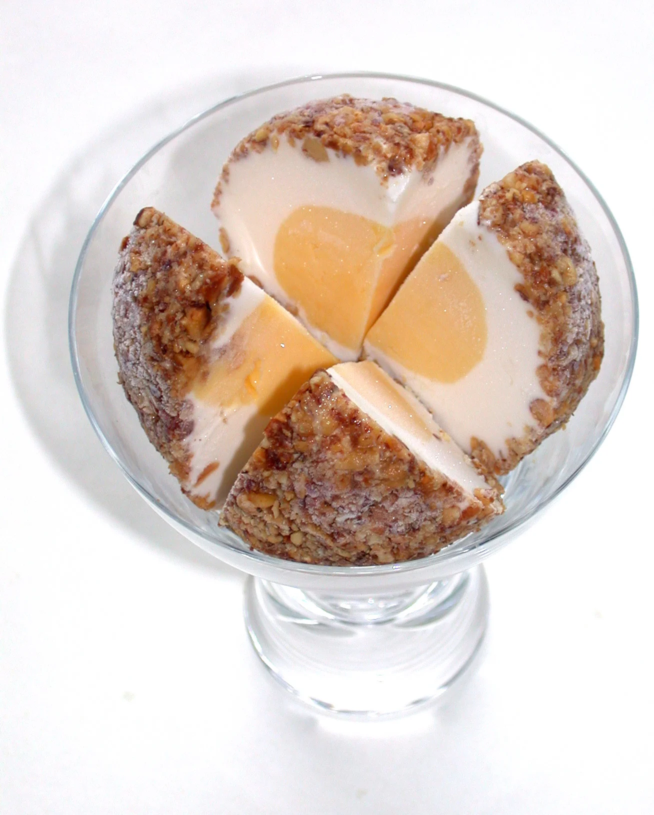 Passionfruit Banana Walnut : Passionfruit sorbet centred in Banana ice cream rolled in chopped toasted walnuts.