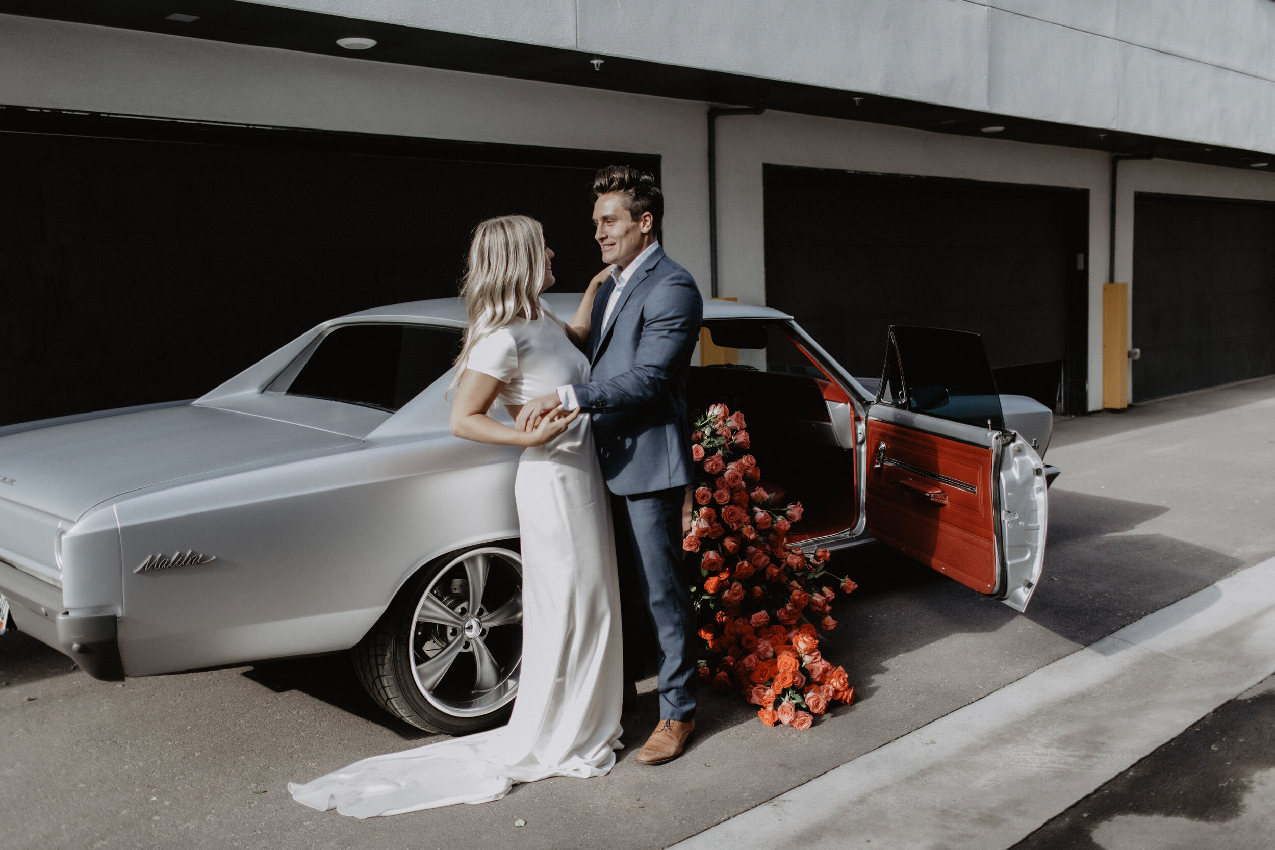  Denver styled wedding shoot with classic muscle cars and red roses in The Label TRINITY wedding dress by a&amp;bé x anna bé bridal shop 