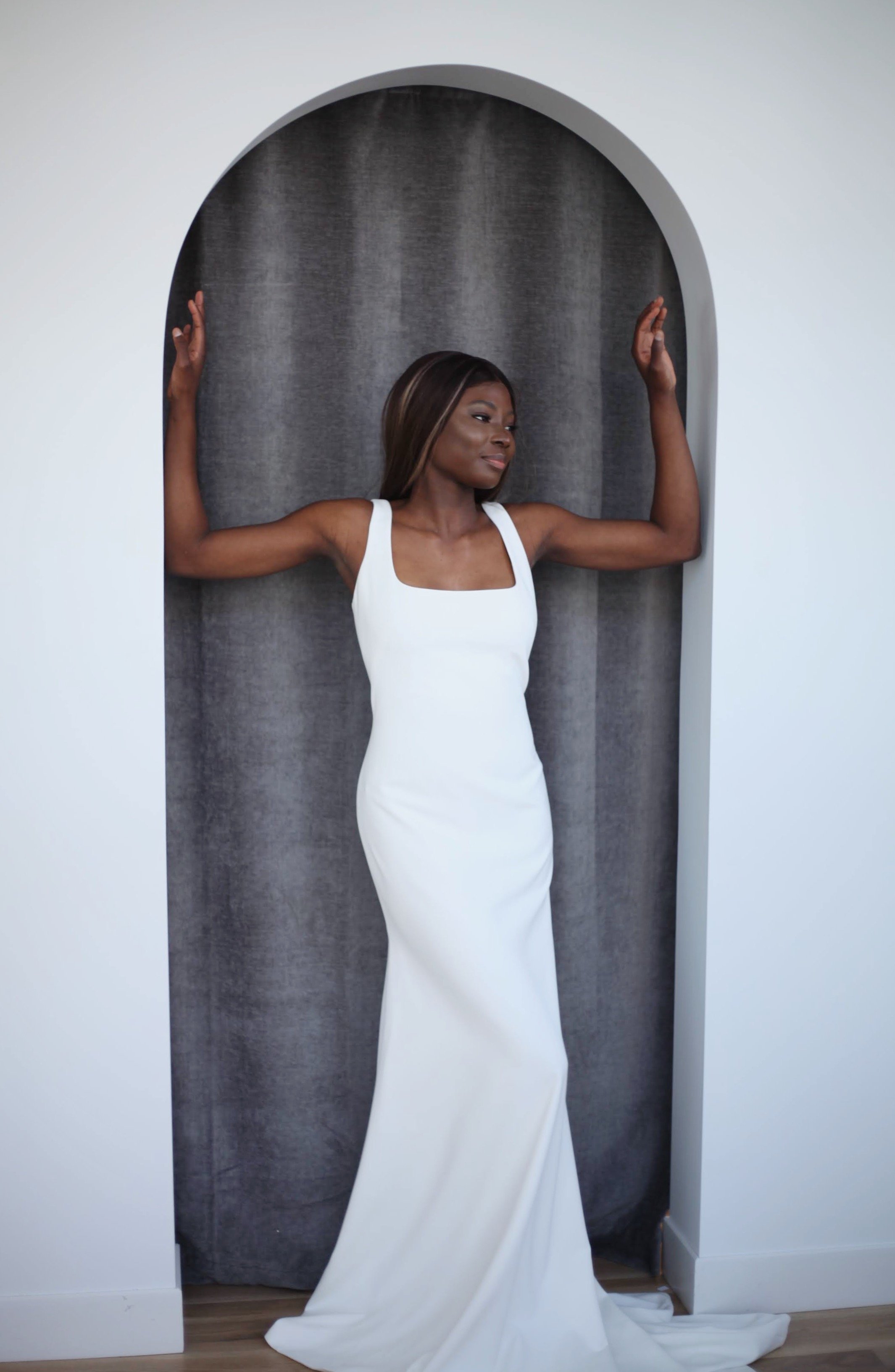 a square neckline crepe wedding dress by the label by aandbe x annabe bridal shops.