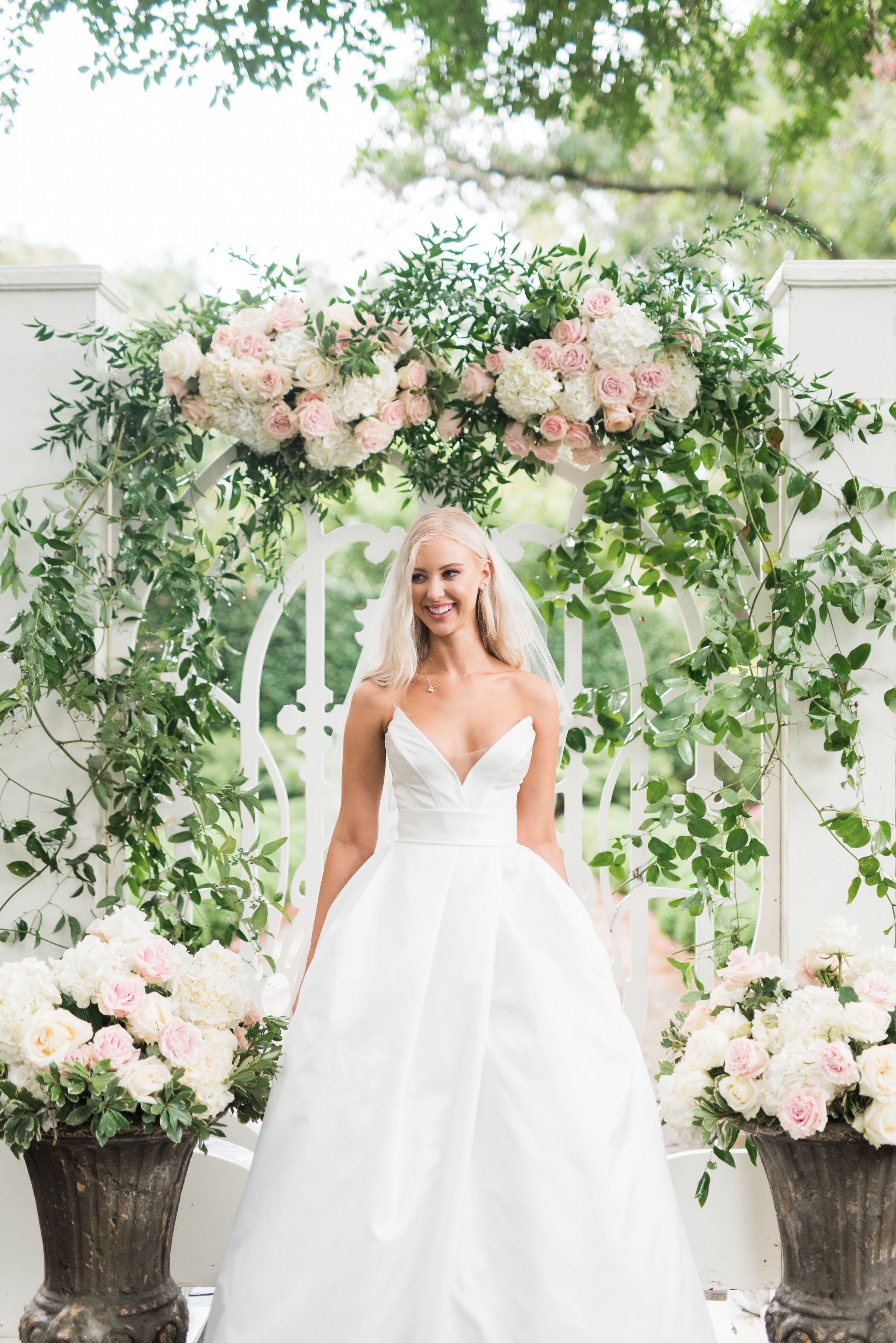 fairytale garden wedding featuring quice by ines di santo a full ball gown with high leg slit