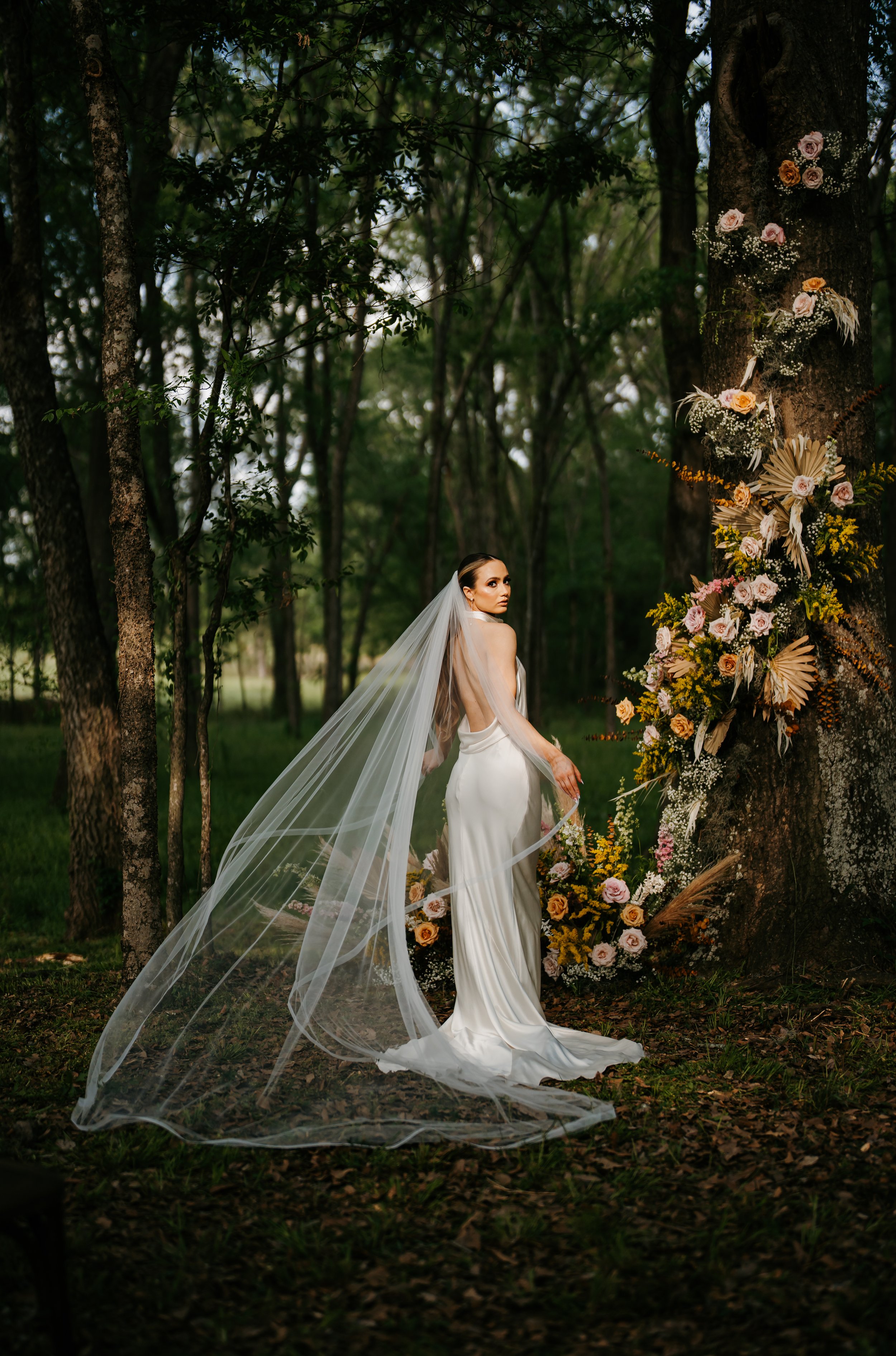 modern silk wedding dress from katherine tash in a woodland styled wedding