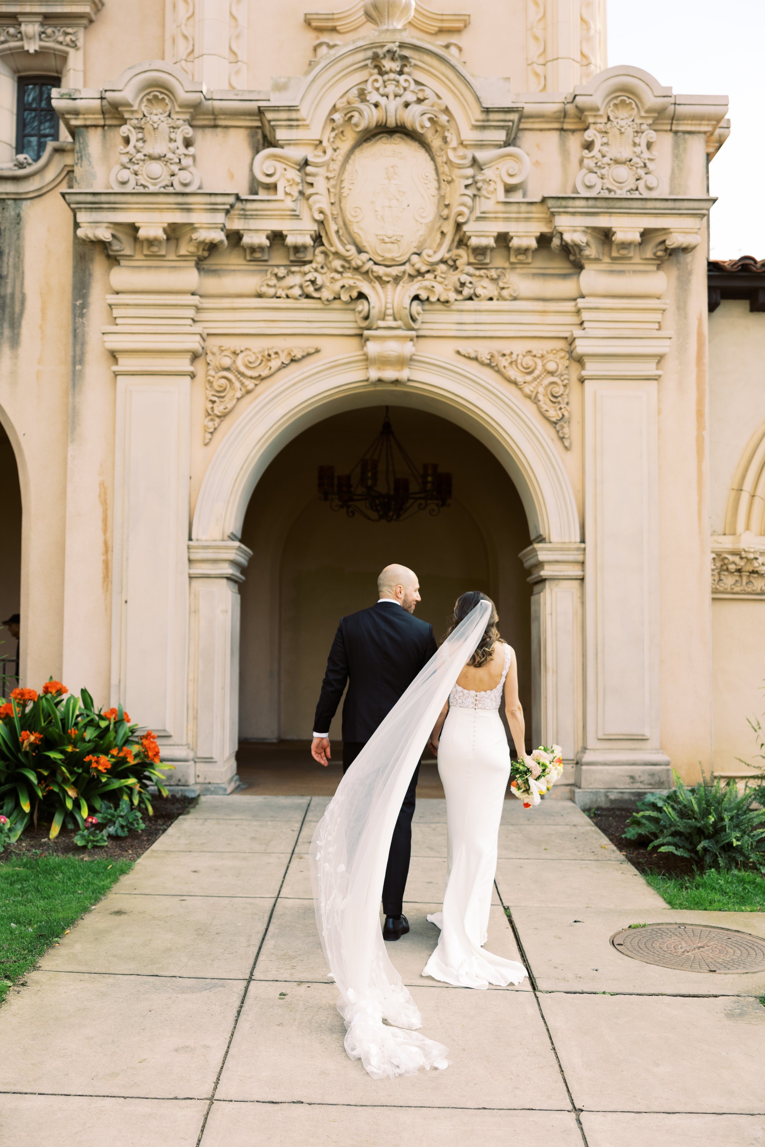 a classic chic real wedding in san diego with a bride wearing alexandra grecco.