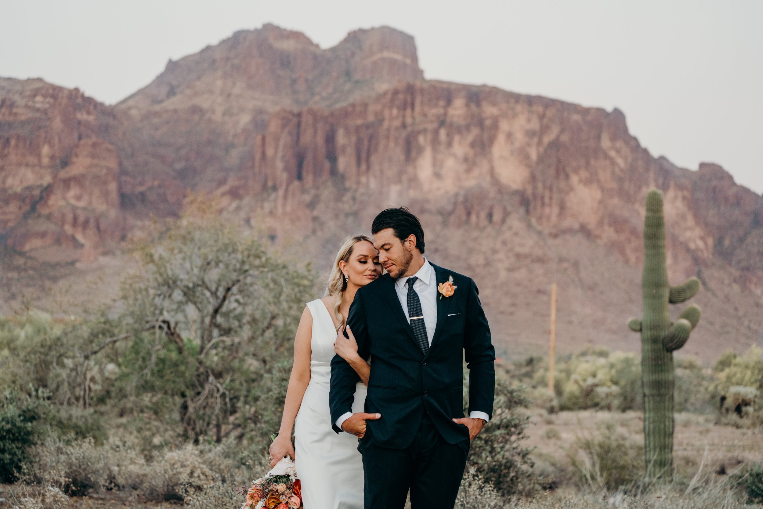 wedding portraits in the desert in scottsdale, arizona featuring a eva lendel crepe clean modern wedding dress.