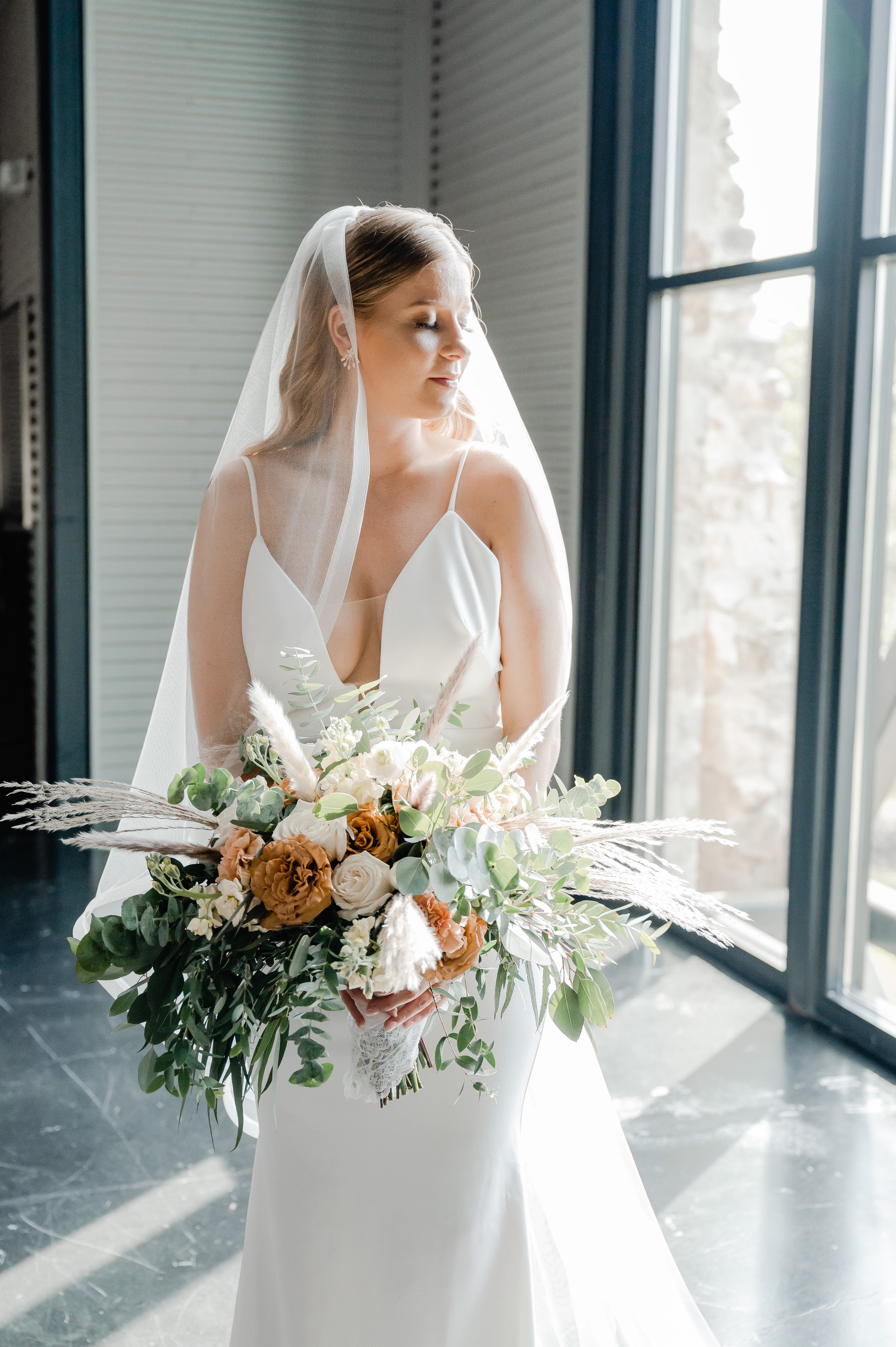 tennyson by the label wedding dress in this chic modern wedding in san antonio texas.