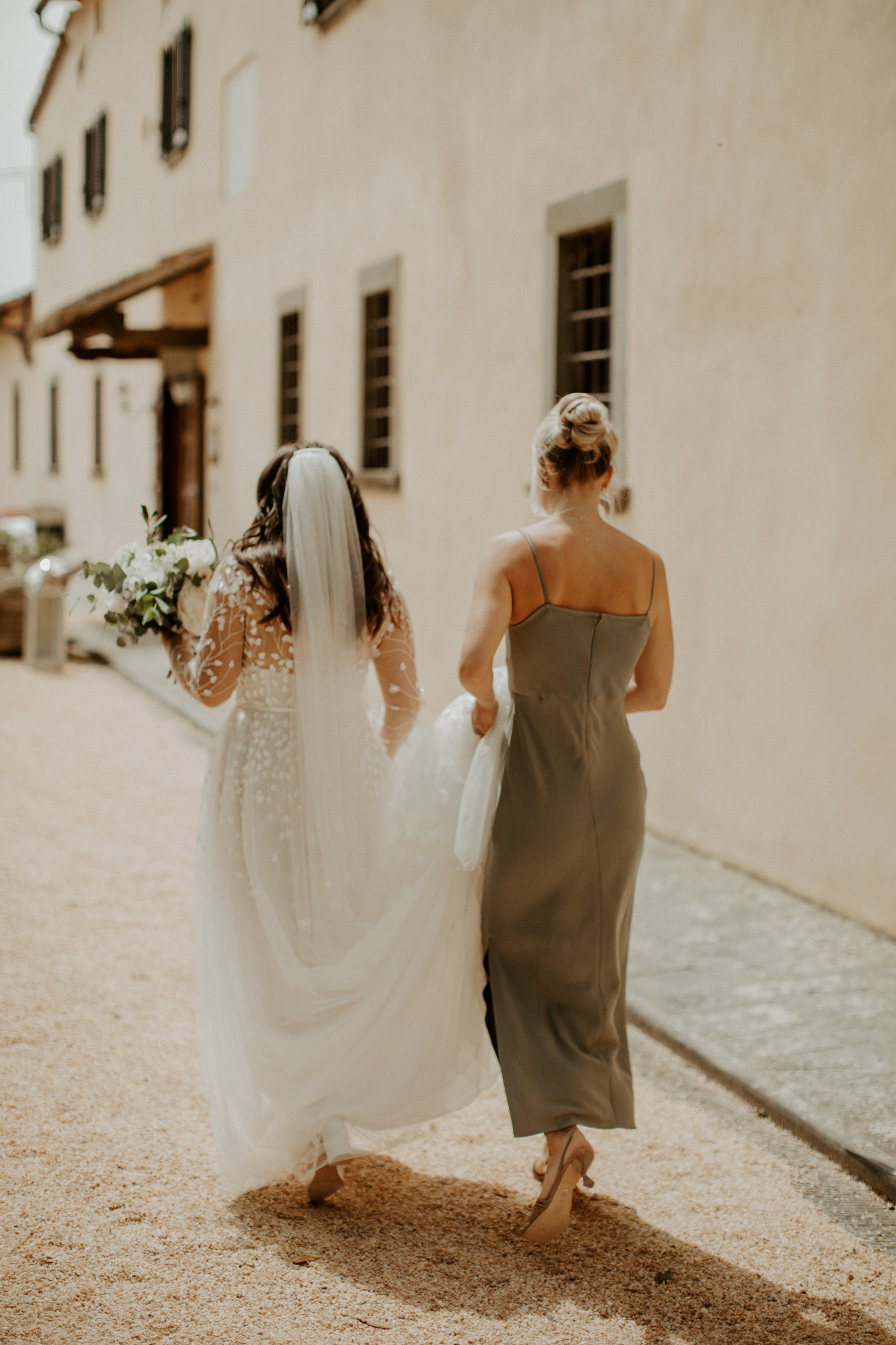 a destination wedding featuring a beaded ines di santo wedding dress