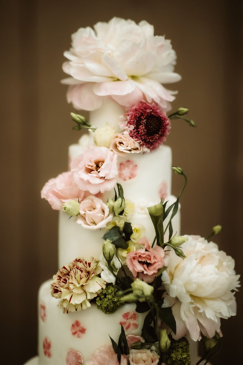 a fresh floral wedding cake in this romantic styled shoot at the four seasons hotel