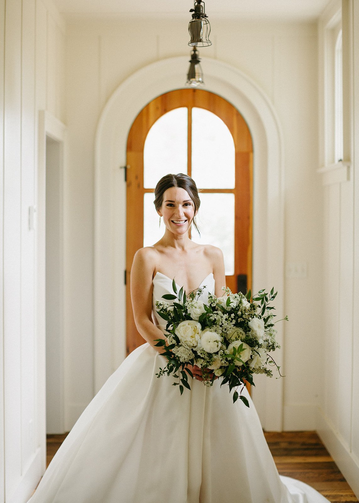 classic bride portrait featuring the quice ballgown by ines di santo at the surf hotel in colorado